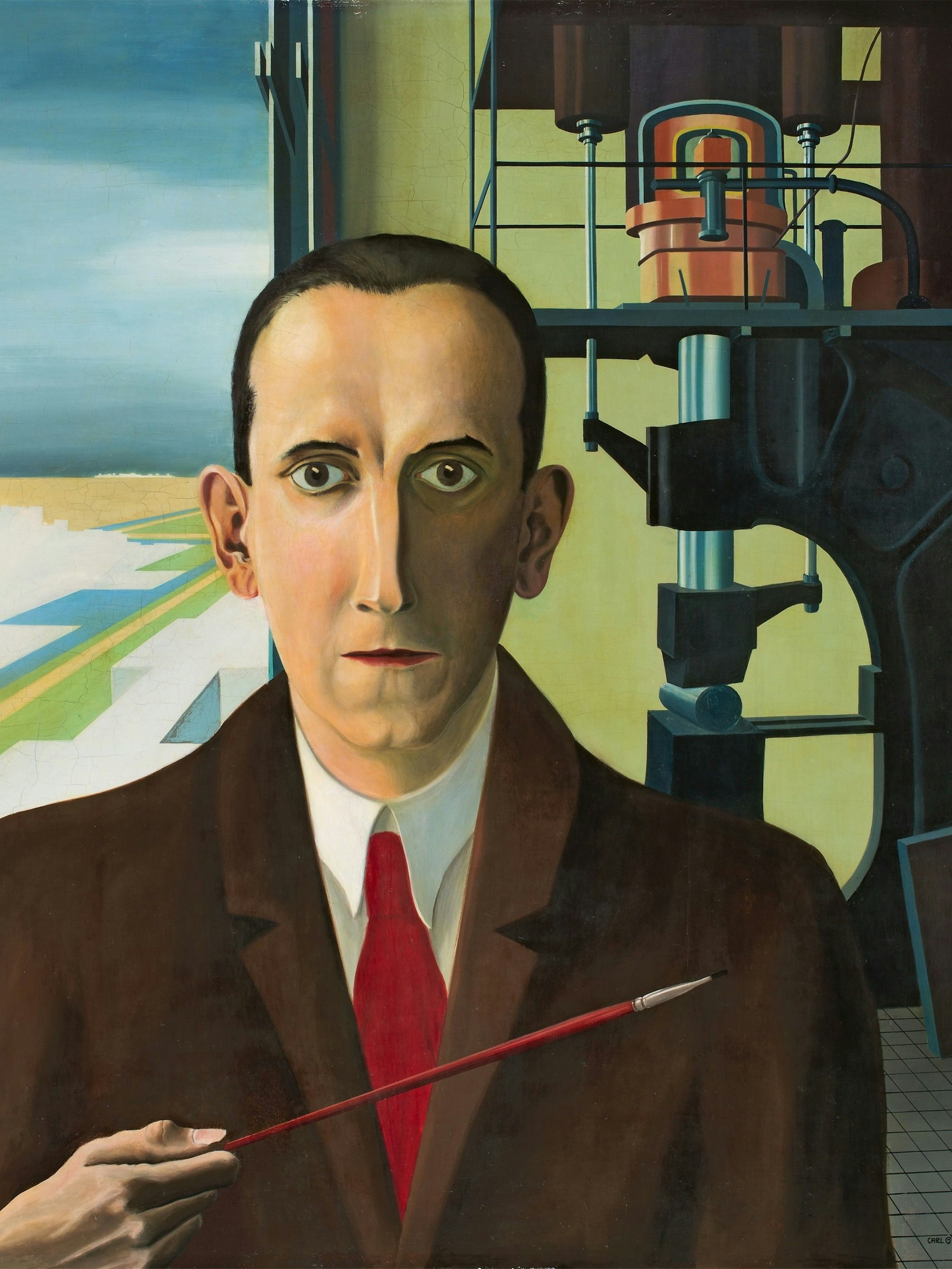 Ein Mann steht mit Pinsel vor einem Dampfhammer.