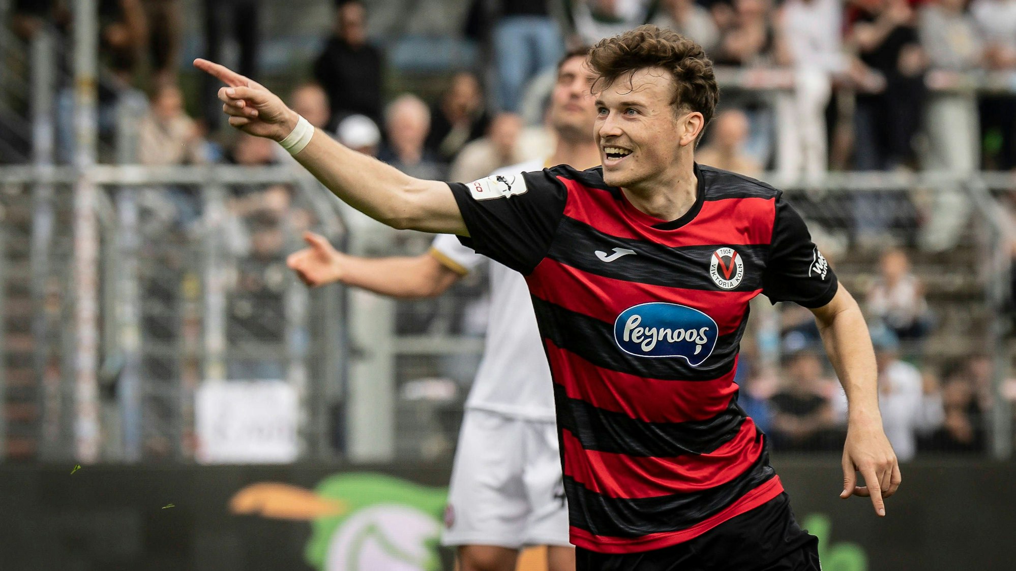KOELN, GERMANY - APRIL 11, 2026: Lucas Wolf Viktoria Köln, 21 celebrates scoring his team s first goal during the 3rd division match between Viktoria Koeln vs. SV Wehen Wiesbaden at the Sportpark Hoehenberg on matchday 7 on April 11, 2026 in Koeln, Germany. DFL REGULATIONS PROHIBIT ANY USE OF PHOTOGRAPHS AS IMAGE SEQUENCES AND/OR QUASI-VIDEO. Nordrhein-Westfalen Germany Copyright: xAxelxKohringx