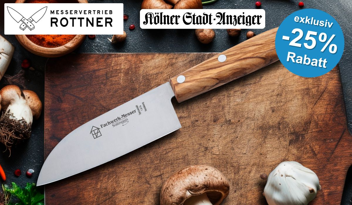 Das Fachwerk-Santoku-Messer auf einem Schneidebrett