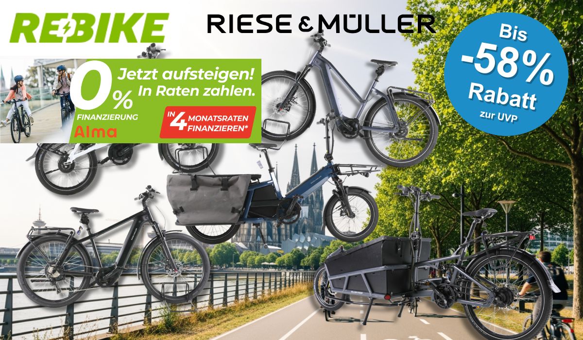 4 verschiedene Riese & Müller E-Bikes vor einem Fahrradweg.