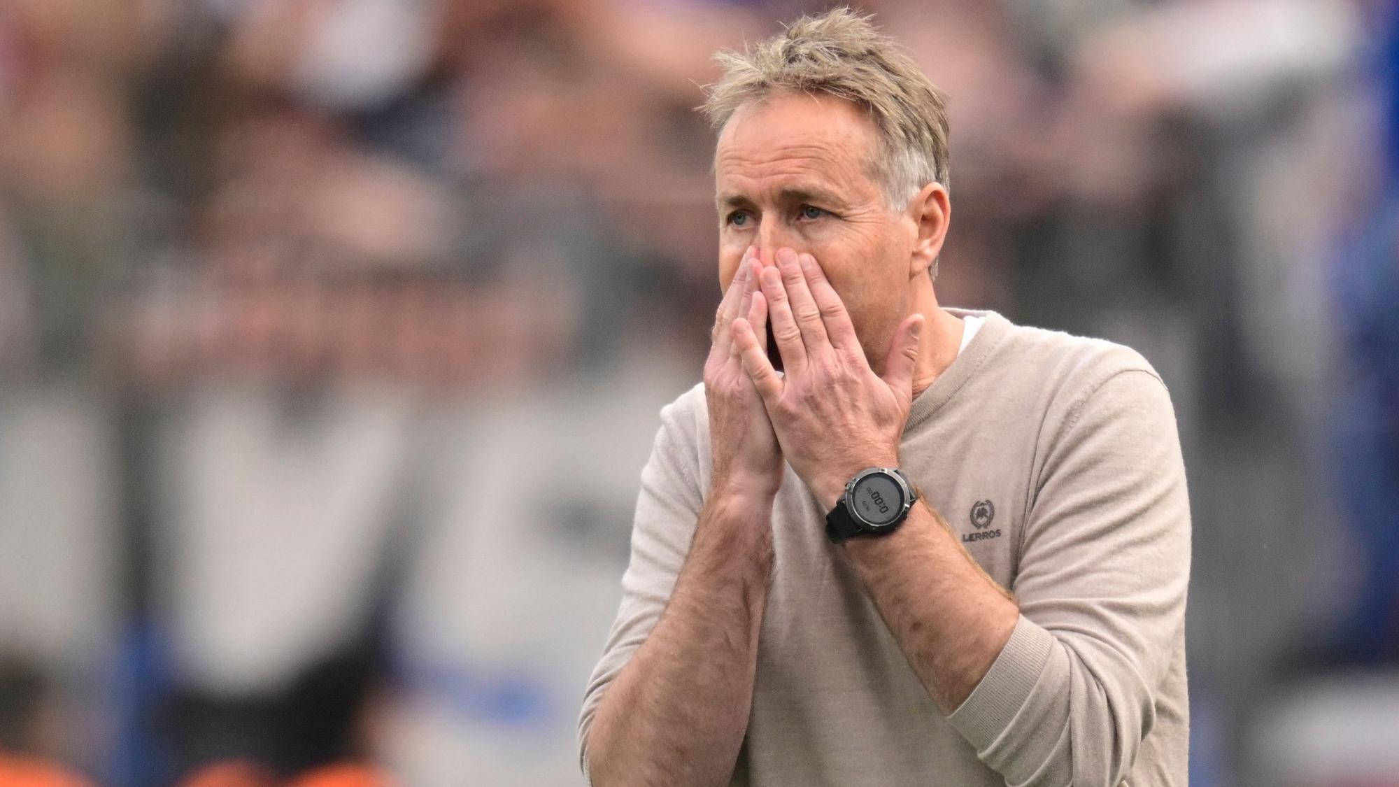 Bayer Leverkusen's Danish head coach Kasper Hjulmand reacts during the German first division Bundesliga football match between Bayer Leverkusen and Hamburger SV (HSV) in Leverkusen, western Germany, on May 16, 2026. (Photo by INA FASSBENDER / AFP) / DFL REGULATIONS PROHIBIT ANY USE OF PHOTOGRAPHS AS IMAGE SEQUENCES AND/OR QUASI-VIDEO