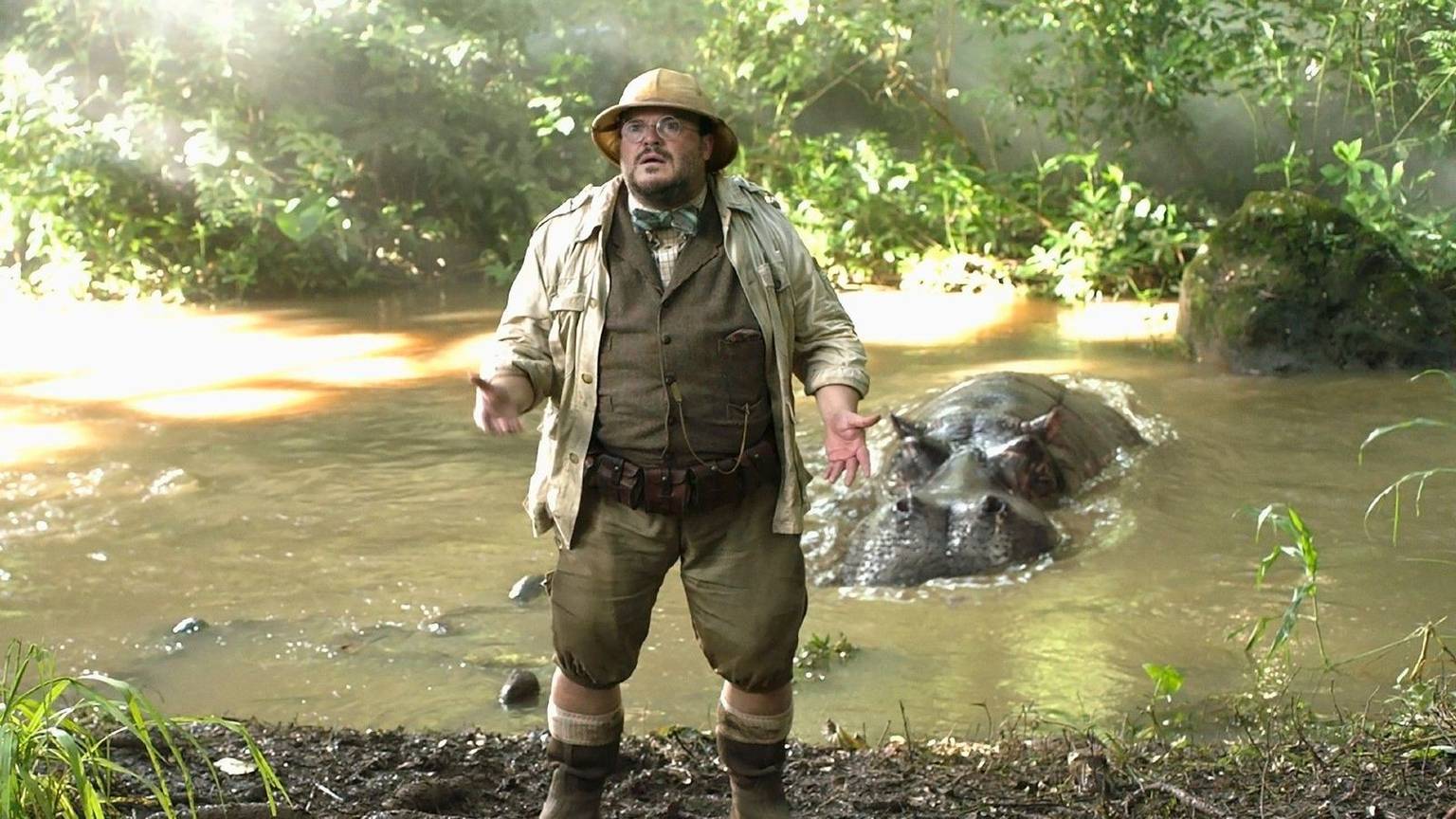 Die Sache mit dem Riesennilpferd im Hintergrund ist für Bethany nicht ganz so schlimm wie die Tatsache, dass sie im Körper eines übergewichtigen alten Mannes (Jack Black) steckt. (Bild: RTL / 2017 Columbia Pictures Industries, Inc.)