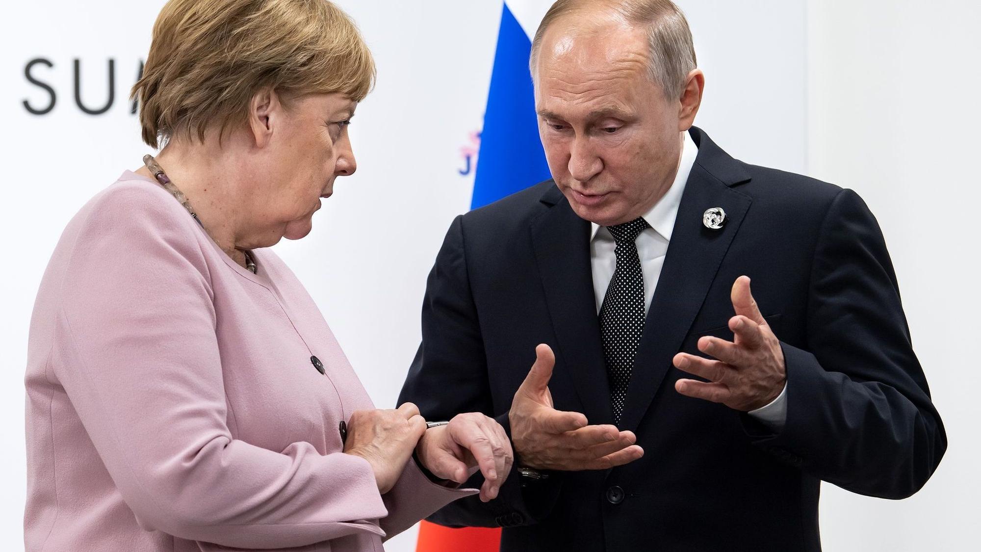 Kanzlerin Angela Merkel und Russlands Präsident Wladimir Putin
