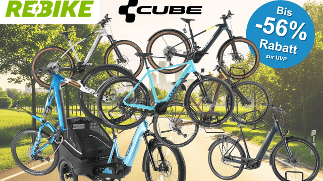 E-Bikes und Fahrräder der Marke Cube vor dem Hintergrund einer sonnigen Landstraße.