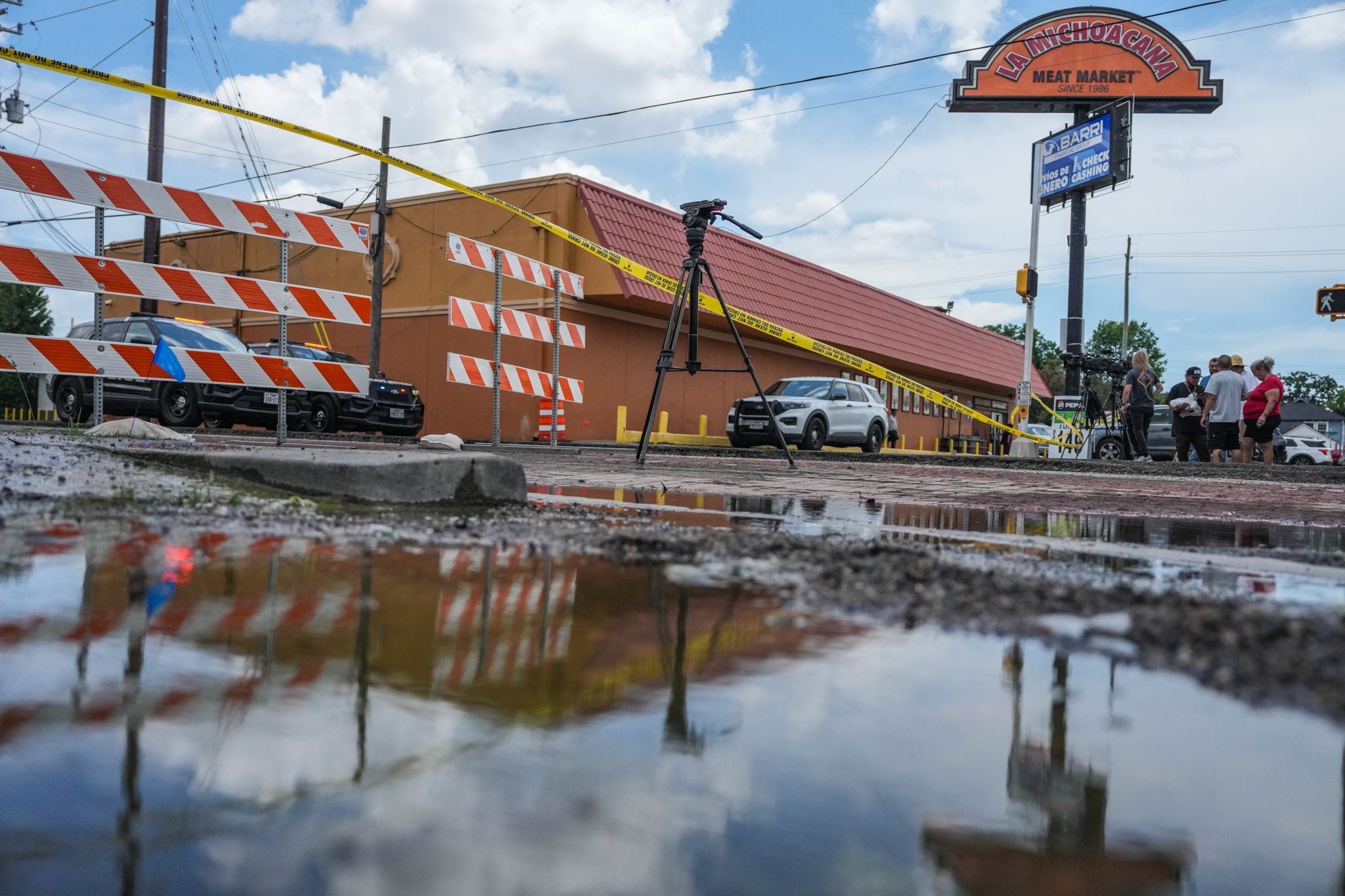 Polizeieinsatz auf der Canal Street in Houston, nachdem Schüsse gefallen waren. Am 7. Juli wurde hier ein Mann von ICE-Mitarbeitern erschossen.
