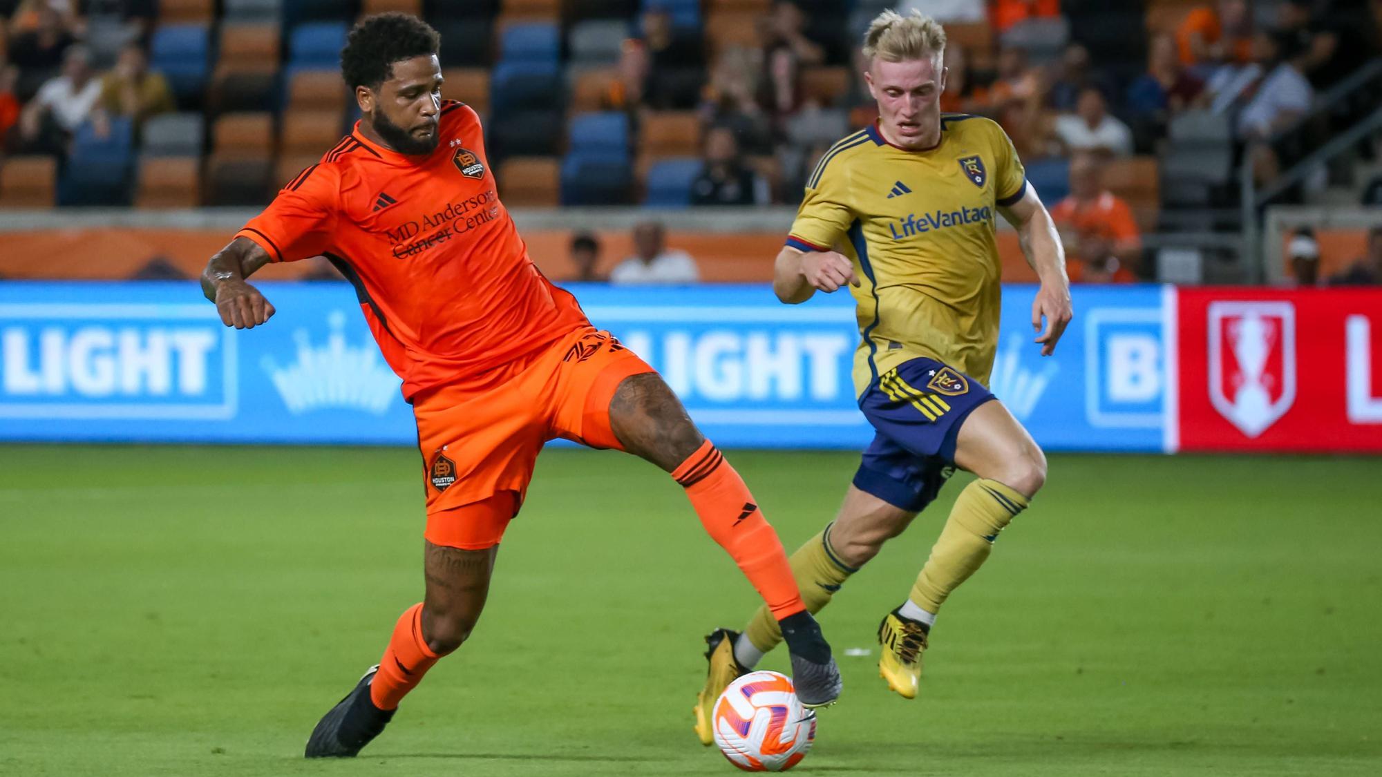 HOUSTON, TX - AUGUST 23: Houston Dynamo defender Micael 31 keeps the ball away from Real Salt Lake defender Jasper Löffelsend 28 in the first half during the US Cup semifinal soccer match between Real Salt Lake and Houston Dynamo on August 23, 2023 at Shell Energy Stadium in Houston, Texas. Photo by Leslie Plaza Johnson/Icon Sportswire SOCCER: AUG 23 US Cup Semifinal - Houston Dynamo vs Real Salt Lake EDITORIAL USE ONLY Icon230823001
