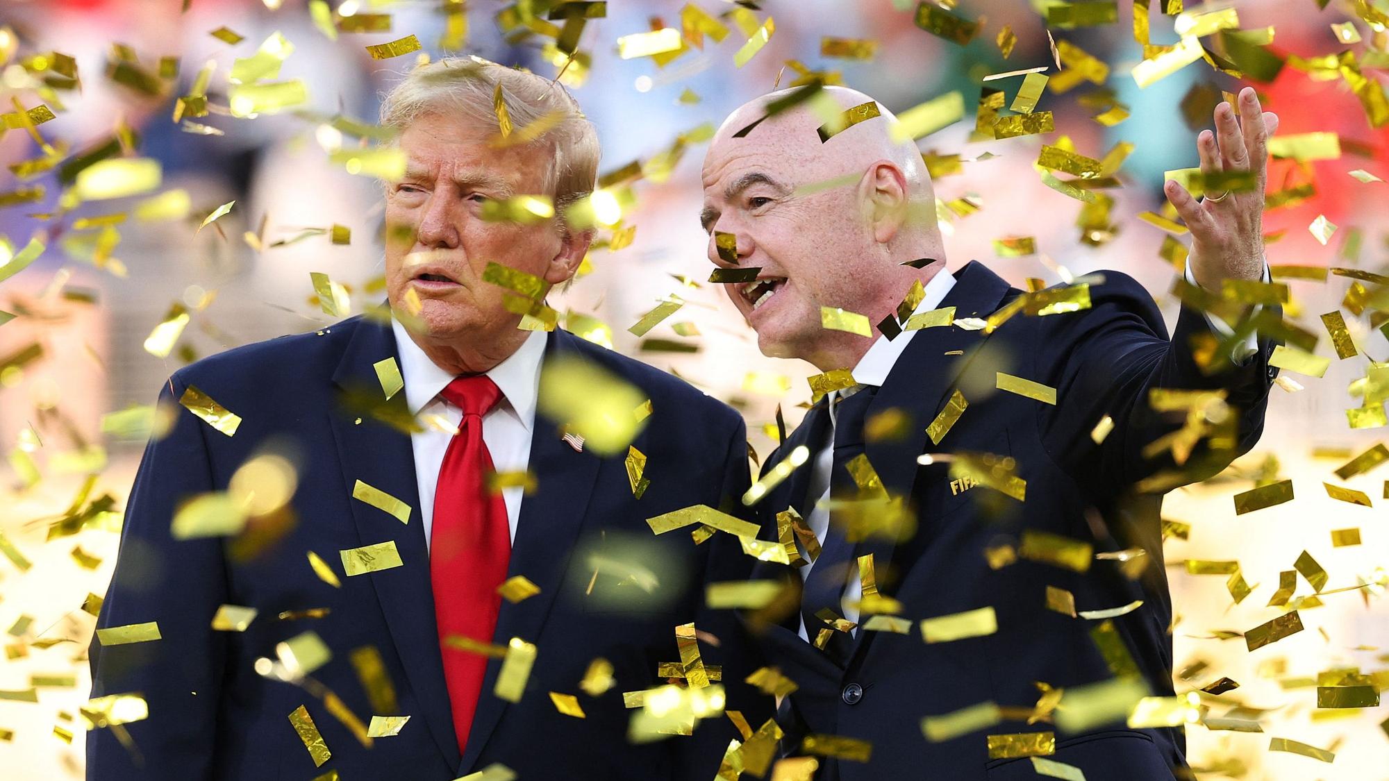 EAST RUTHERFORD, NEW JERSEY - JULY 19: U.S. President Donald Trump and FIFA President Gianni Infantino look on after presenting the FIFA World Cup Winner's Trophy to Spain during the FIFA World Cup 2026 Final match between Spain and Argentina at New York New Jersey Stadium on July 19, 2026 in East Rutherford, New Jersey. Carl Recine/Getty Images/AFP (Photo by Carl Recine / GETTY IMAGES NORTH AMERICA / Getty Images via AFP)