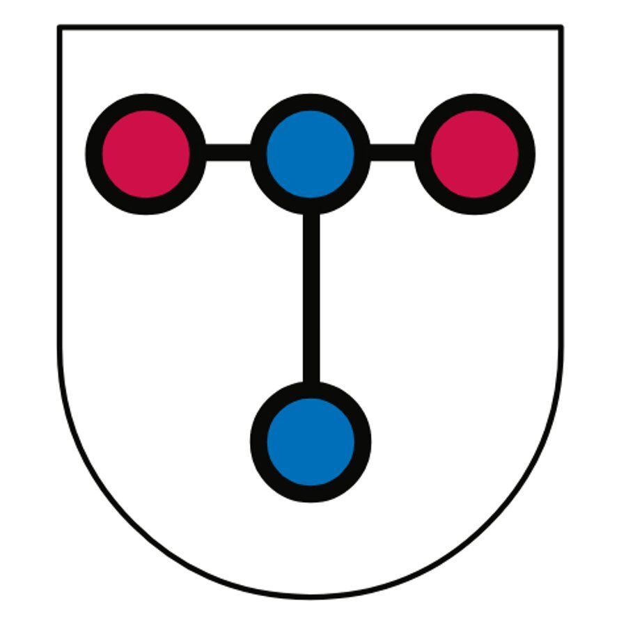 Auf dem Wappen der Stadt Troisdorf bilden zwei rote Kreise, links und rechts außen und zwei vertikale blaue Kreise eine T-Formation.