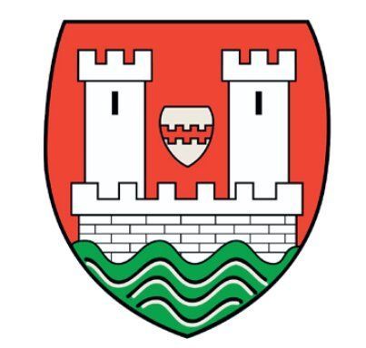 Auf dem Wappen der Stadt Niederkassel befindet sich ein kleineres Schild zwischen zwei Burgtürmen. Vor der Burg gibt es eine gewellte Fläche.