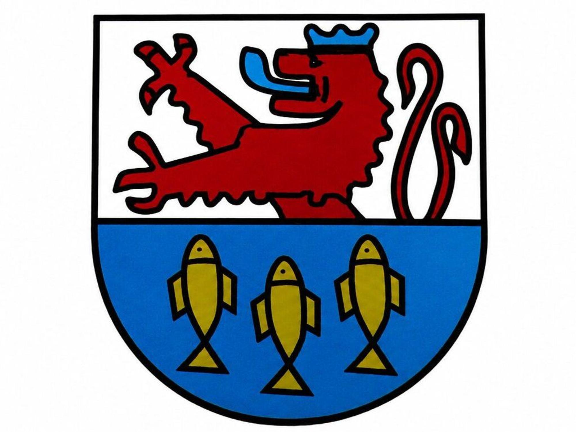 Oben ein Bergischer Löwe und unten drei goldene Fische zeigt das Wappen der Gemeinde Neunkirchen-Seelscheid.