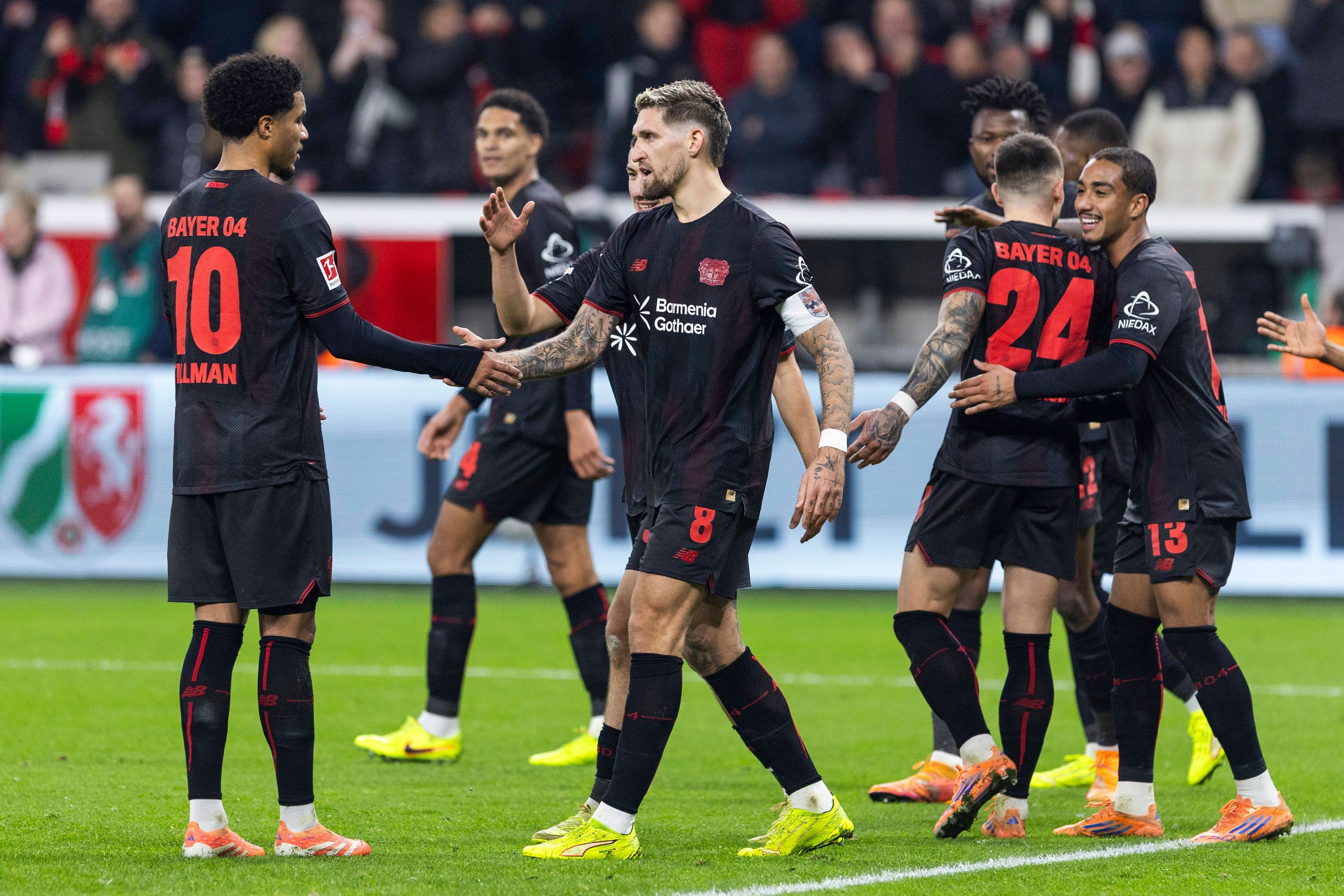 LEVERKUSEN, GERMANY - DECEMBER 13: Celebration of Robert Andrich Bayer 04 Leverkusen, 8 after his goal, with Malik Tillman Bayer 04 Leverkusen, 10 during the Bundesliga match between Bayer Leverkusen vs. 1. FC Koeln on matchday 14 at BayArena on December 13, 2025 in Leverkusen, Germany. DFL regulations prohibit any use of photographs as image sequences and/or quasi-video***No image usage outside of Finland*** NRW Germany Copyright: xBEAUTIFULxSPORTS/Meuselx