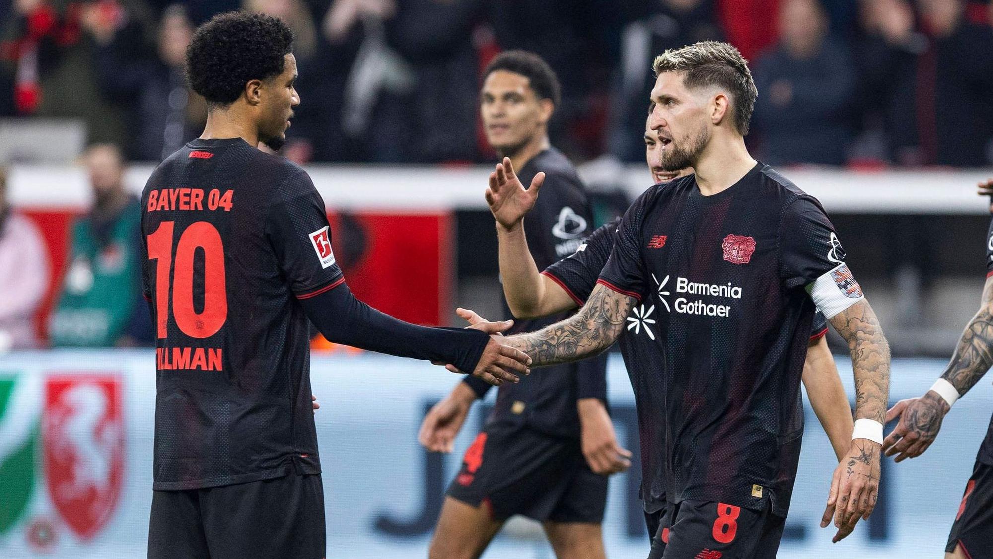 LEVERKUSEN, GERMANY - DECEMBER 13: Celebration of Robert Andrich Bayer 04 Leverkusen, 8 after his goal, with Malik Tillman Bayer 04 Leverkusen, 10 during the Bundesliga match between Bayer Leverkusen vs. 1. FC Koeln on matchday 14 at BayArena on December 13, 2025 in Leverkusen, Germany. DFL regulations prohibit any use of photographs as image sequences and/or quasi-video***No image usage outside of Finland*** NRW Germany Copyright: xBEAUTIFULxSPORTS/Meuselx