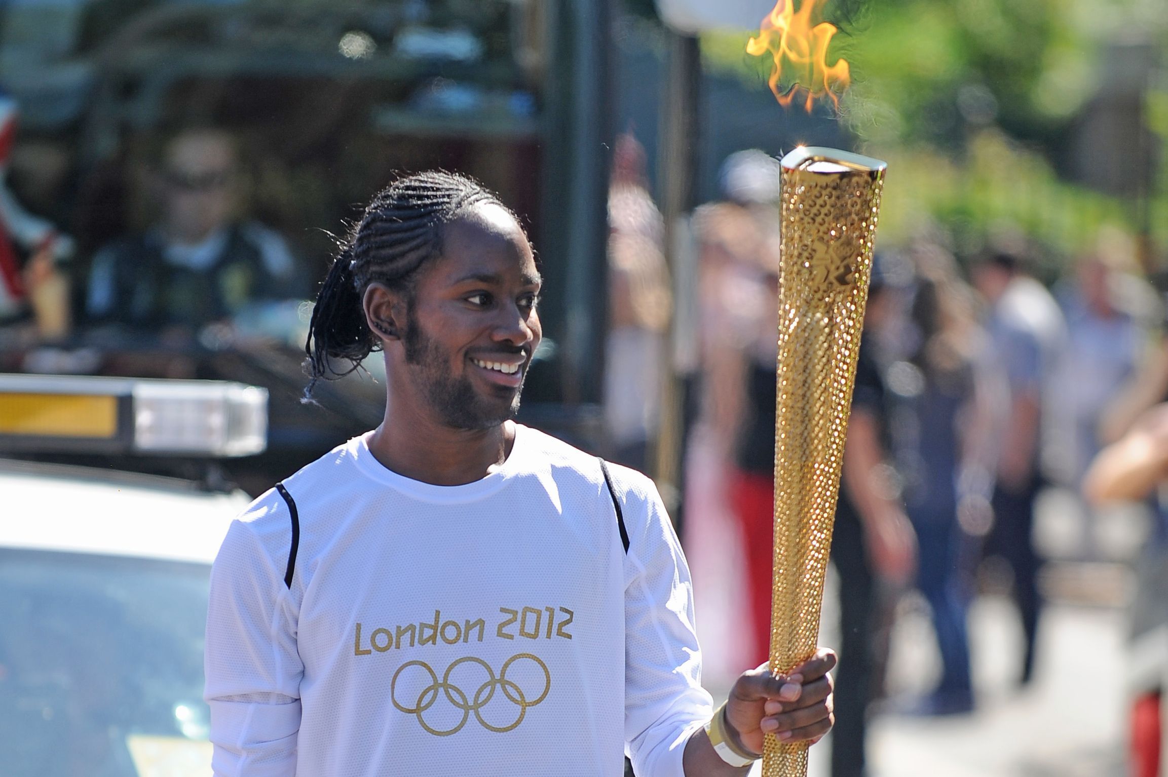 Jason Arday, trägt die olympische Fackel auf der Etappe des Fackellaufs zwischen Sutton (Londoner Stadtbezirk) und Merton (Londoner Stadtbezirk). (Archivbild)