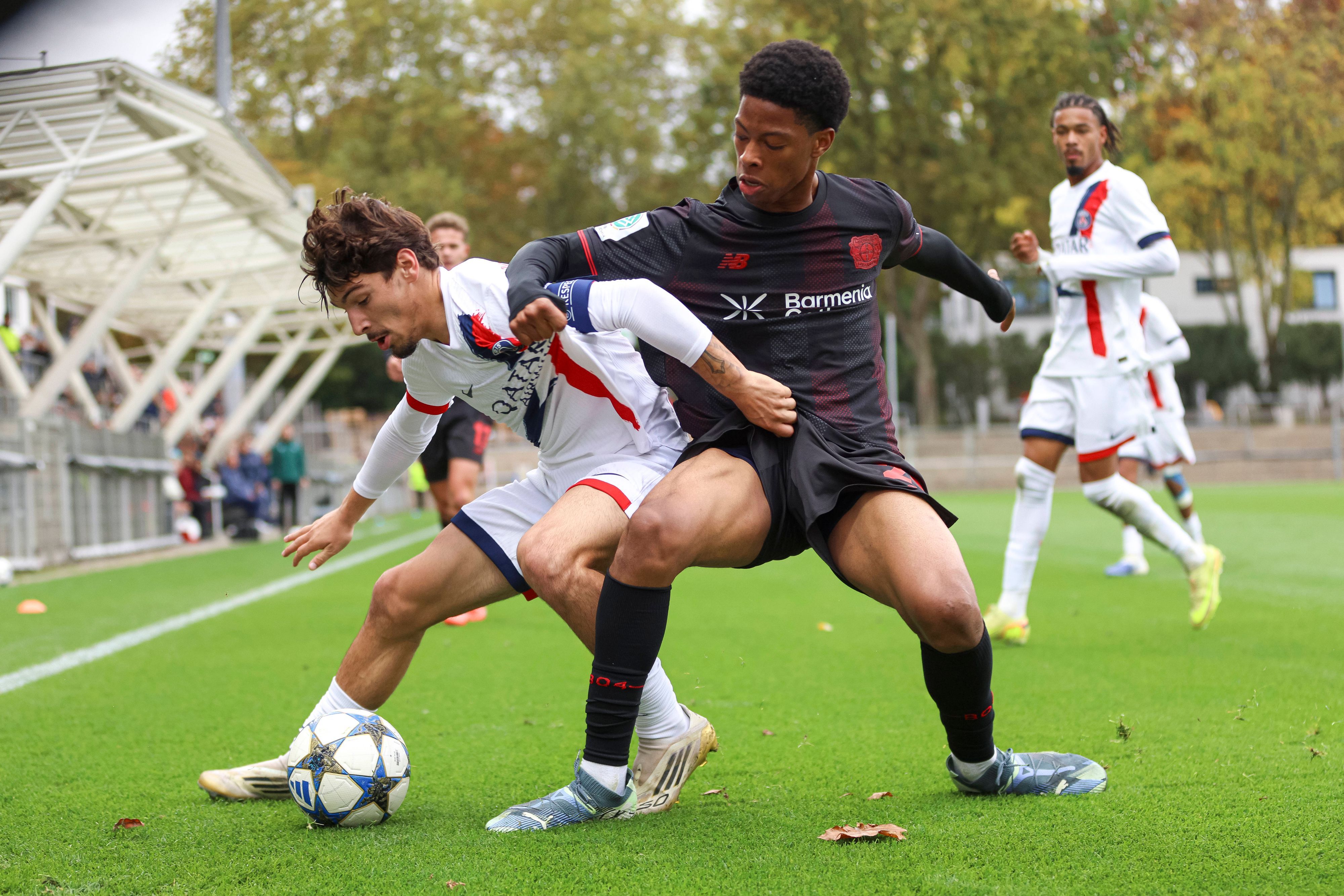 Thomas Cordier FC Paris Saint-Germain U19 und Ivan Massek Bayer Leverkusen U19 battle for the ball during the UEFA Youth League 2025/26 match between Bayer 04 Leverkusen and Paris Saint-Germain on October 21, 2025 in Leverkusen, Germany. Photo by Oliver Kaelke/DeFodi Images *** not used for Axel Springer / ZDF *** Thomas Cordier FC Paris Saint Germain U19 and Ivan Massek Bayer Leverkusen U19 battle for the ball during the UEFA Youth League 2025 26 match between Bayer 04 Leverkusen and Paris Saint Germain on October 21, 2025 in Leverkusen, Germany Photo by Oliver Kaelke DeFodi Images not used for Axel Springer ZDF