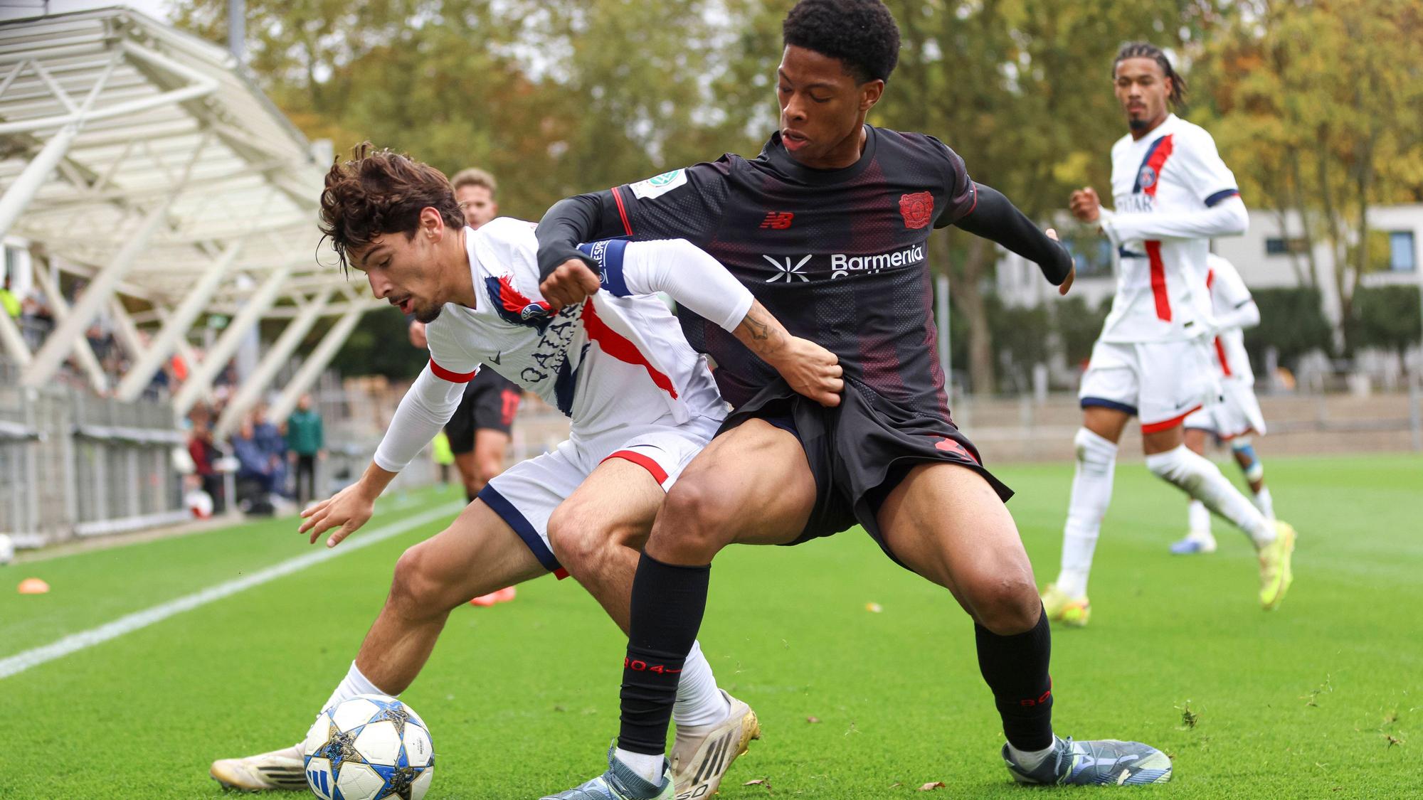 Thomas Cordier FC Paris Saint-Germain U19 und Ivan Massek Bayer Leverkusen U19 battle for the ball during the UEFA Youth League 2025/26 match between Bayer 04 Leverkusen and Paris Saint-Germain on October 21, 2025 in Leverkusen, Germany. Photo by Oliver Kaelke/DeFodi Images *** not used for Axel Springer / ZDF *** Thomas Cordier FC Paris Saint Germain U19 and Ivan Massek Bayer Leverkusen U19 battle for the ball during the UEFA Youth League 2025 26 match between Bayer 04 Leverkusen and Paris Saint Germain on October 21, 2025 in Leverkusen, Germany Photo by Oliver Kaelke DeFodi Images not used for Axel Springer ZDF