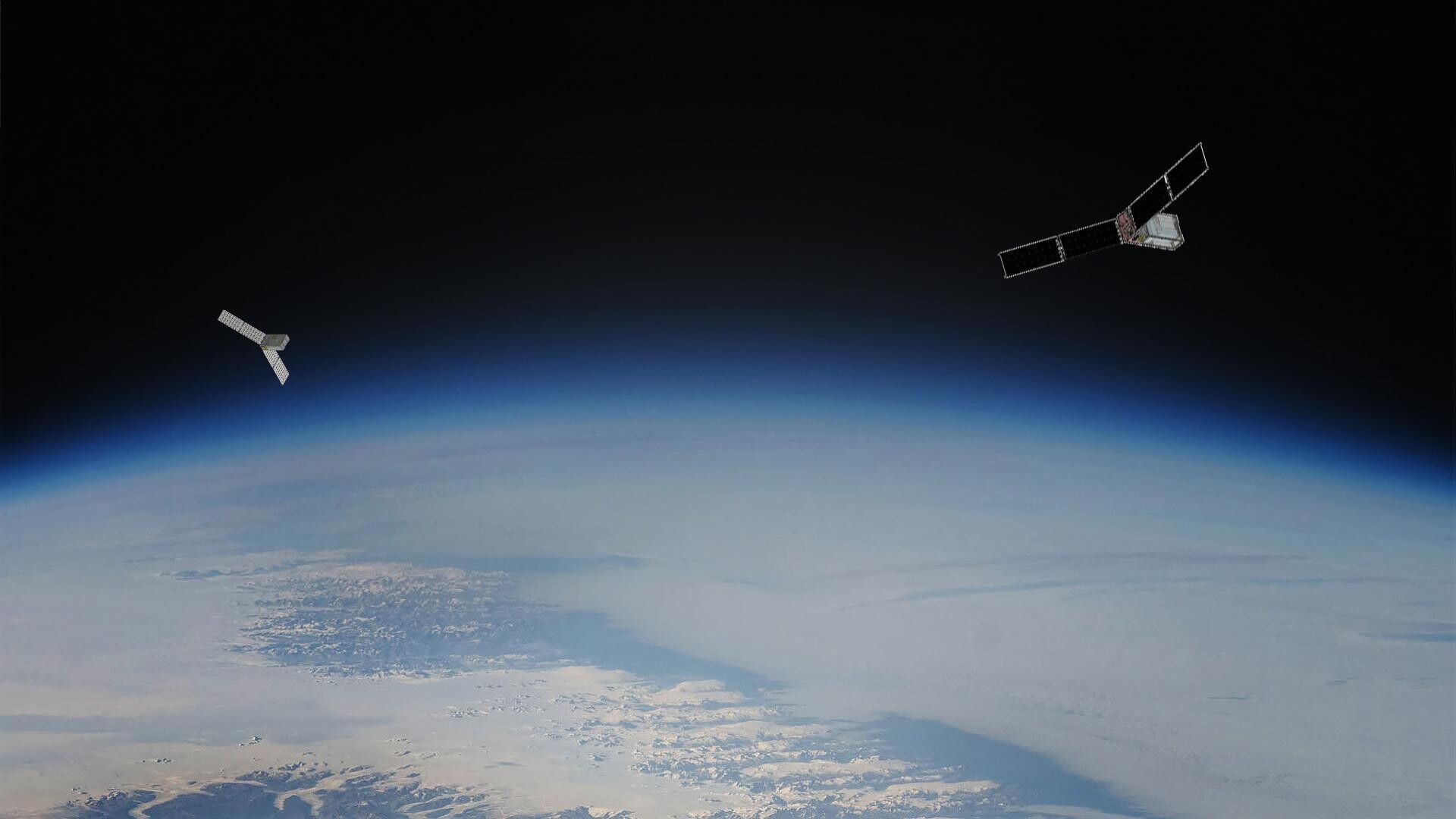 Zwei Satelliten schweben über der Erde.