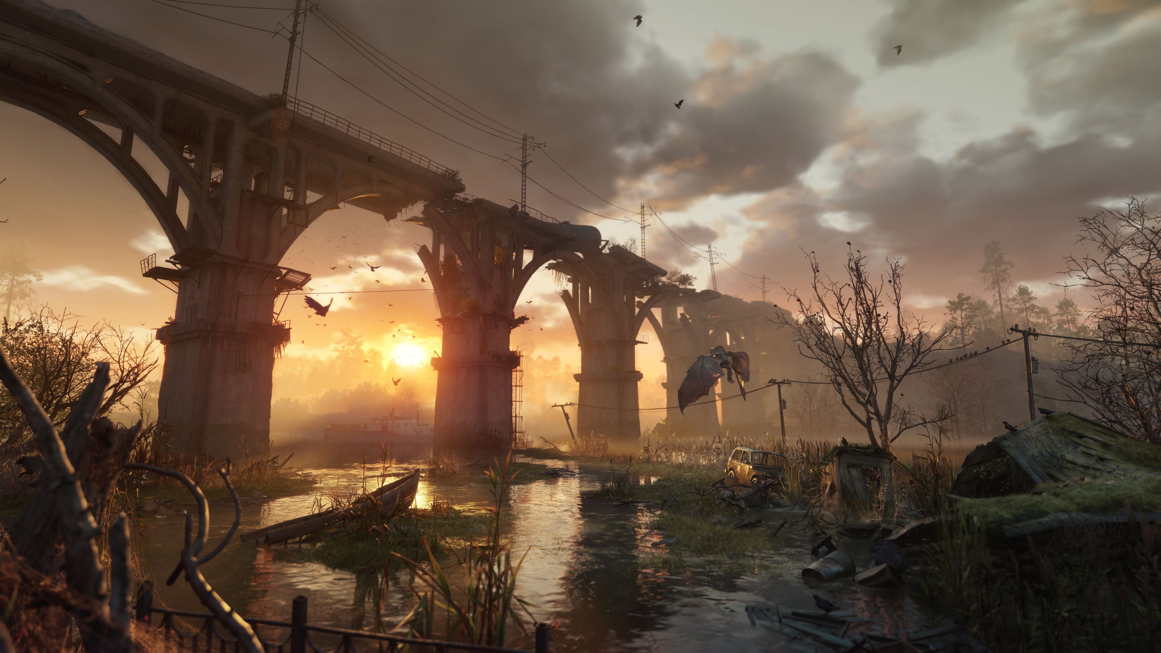 Szene aus dem Spiel „Metro“: Eine Landschaft mit einer zerstörten Brücke beim Sonnenuntergang