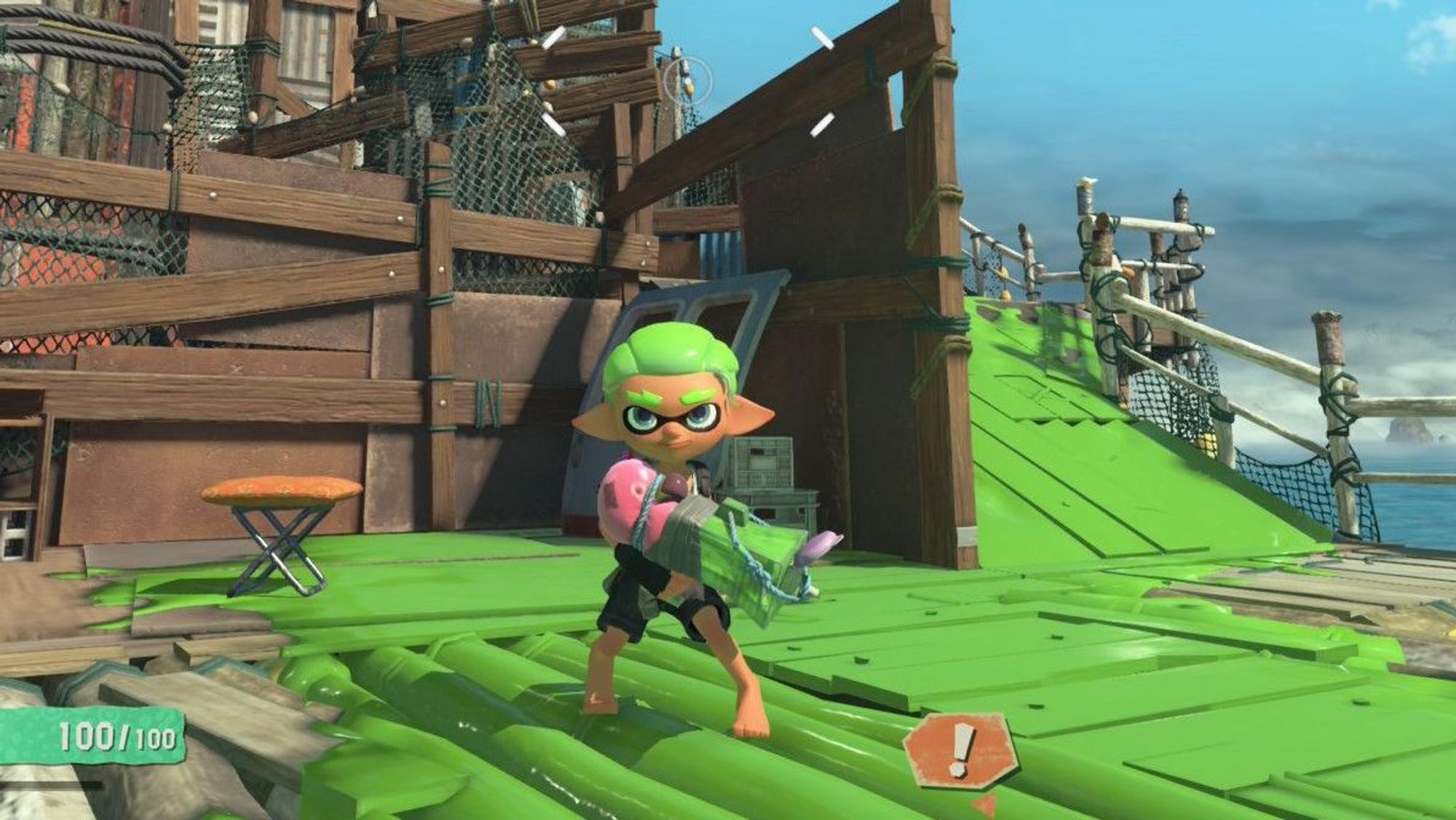 Screenshot aus Splatoon-Raiders: Eine Figur mit spitzen Ohren und grünen Haaren hält eine Waffe gefüllt mit grüner Farbe in den Händen.