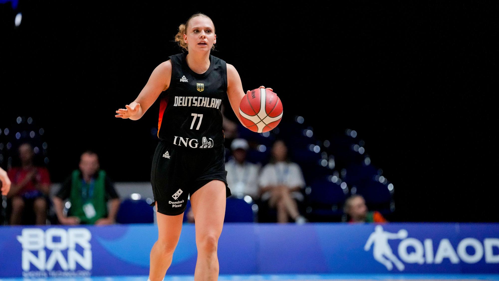 Franka Wittenberg Germany controls the ball during the women s basketball match in the group phase between Chinese Taipei and Germany on Day 5 of the FISU World University Games Rhine-Ruhr at Grugahalle on July 20, 2025 in Essen, Germany. Photo by Alex Gottschalk/DeFodi Images *** Franka Wittenberg Germany controls the ball during the women s basketball match in the group phase between Chinese Taipei and Germany on Day 5 of the FISU World University Games Rhine Ruhr at Grugahalle on July 20, 2025 in Essen, Germany Photo by Alex Gottschalk DeFodi Images