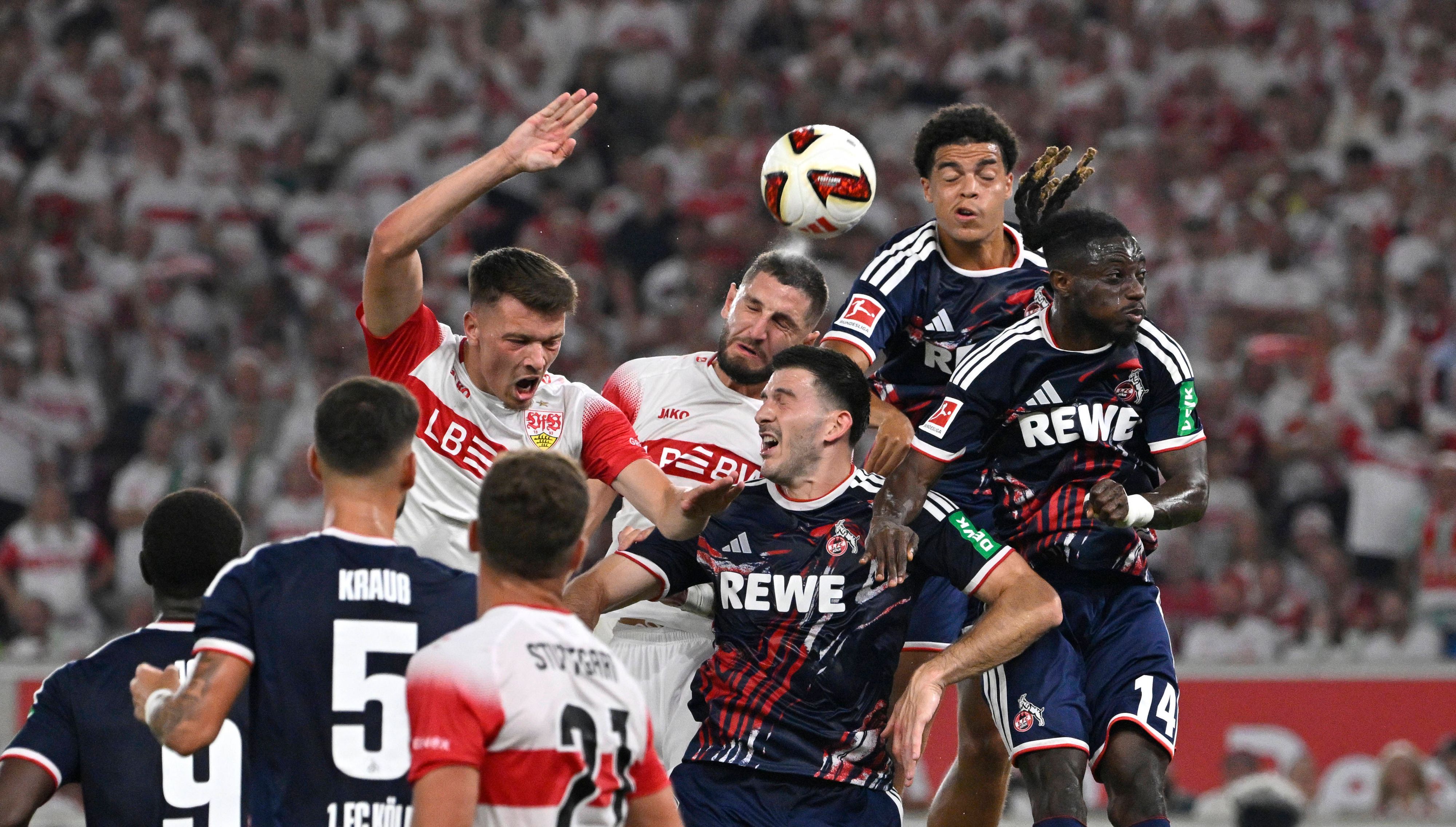 Strafraumszene, Torraumszene Kopfballduell Zweikampf Aktion Dzenan Pejcinovic VfB Stuttgart 17 Jeff Chabot VfB Stuttgart 24 Luka Lochoshvili 1. FC Koeln KOE 24 VfB Stuttgart vs 1. FC Koeln 04.09.2026 DFL REGULATIONS PROHIBIT ANY USE OF PHOTOGRAPHS AS IMAGE SEQUENCES AND/OR QUASI-VIDEO VfB Stuttgart vs 1. FC Koeln *** Penalty area play, Goalmouth scene, header duel, tackle, action: Dzenan Pejcinovic VfB Stuttgart 17, Jeff Chabot VfB Stuttgart 24, Luka Lochoshvili 1. FC Köln KOE 24. VfB Stuttgart vs. 1. FC Köln, September 4, 2026, DFL regulations prohibit any use of photographs as image sequences and/or quasi-video. VfB Stuttgart vs. 1. FC Köln