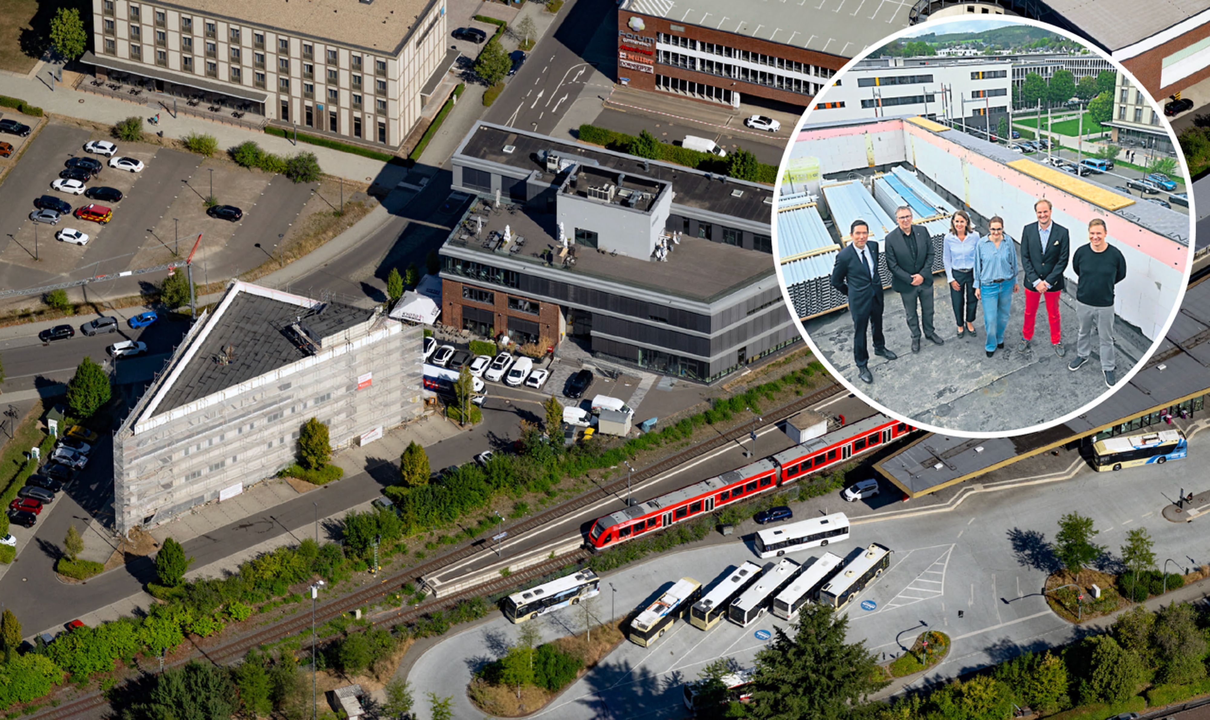 Das neue Prisma (links) schließt sich gleich an die Halle 51 an. Gestern feierten Bauherr und Mieter mit der Stadt Richtfest.
