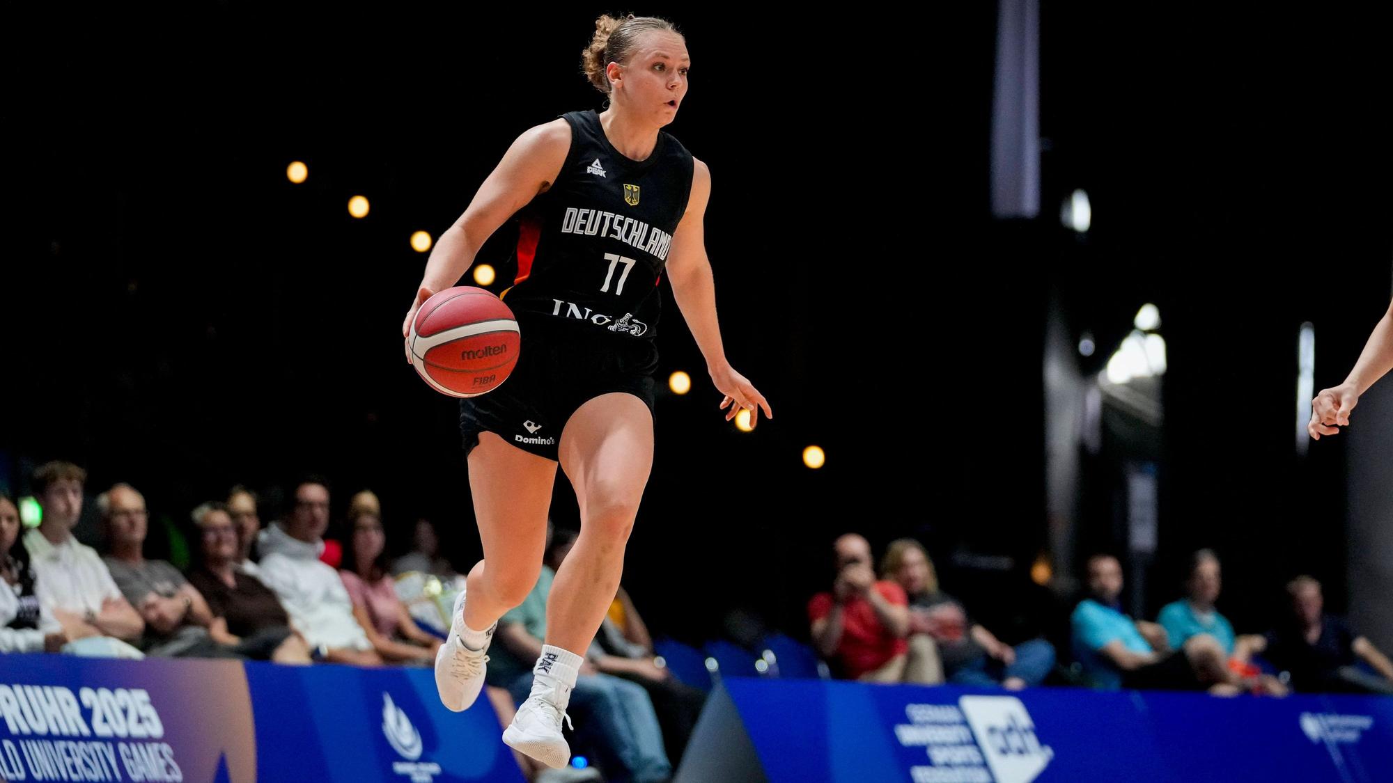 Franka Wittenberg Germany controls the ball during the women s basketball match in the group phase between Chinese Taipei and Germany on Day 5 of the FISU World University Games Rhine-Ruhr at Grugahalle on July 20, 2025 in Essen, Germany. Photo by Alex Gottschalk/DeFodi Images *** Franka Wittenberg Germany controls the ball during the women s basketball match in the group phase between Chinese Taipei and Germany on Day 5 of the FISU World University Games Rhine Ruhr at Grugahalle on July 20, 2025 in Essen, Germany Photo by Alex Gottschalk DeFodi Images