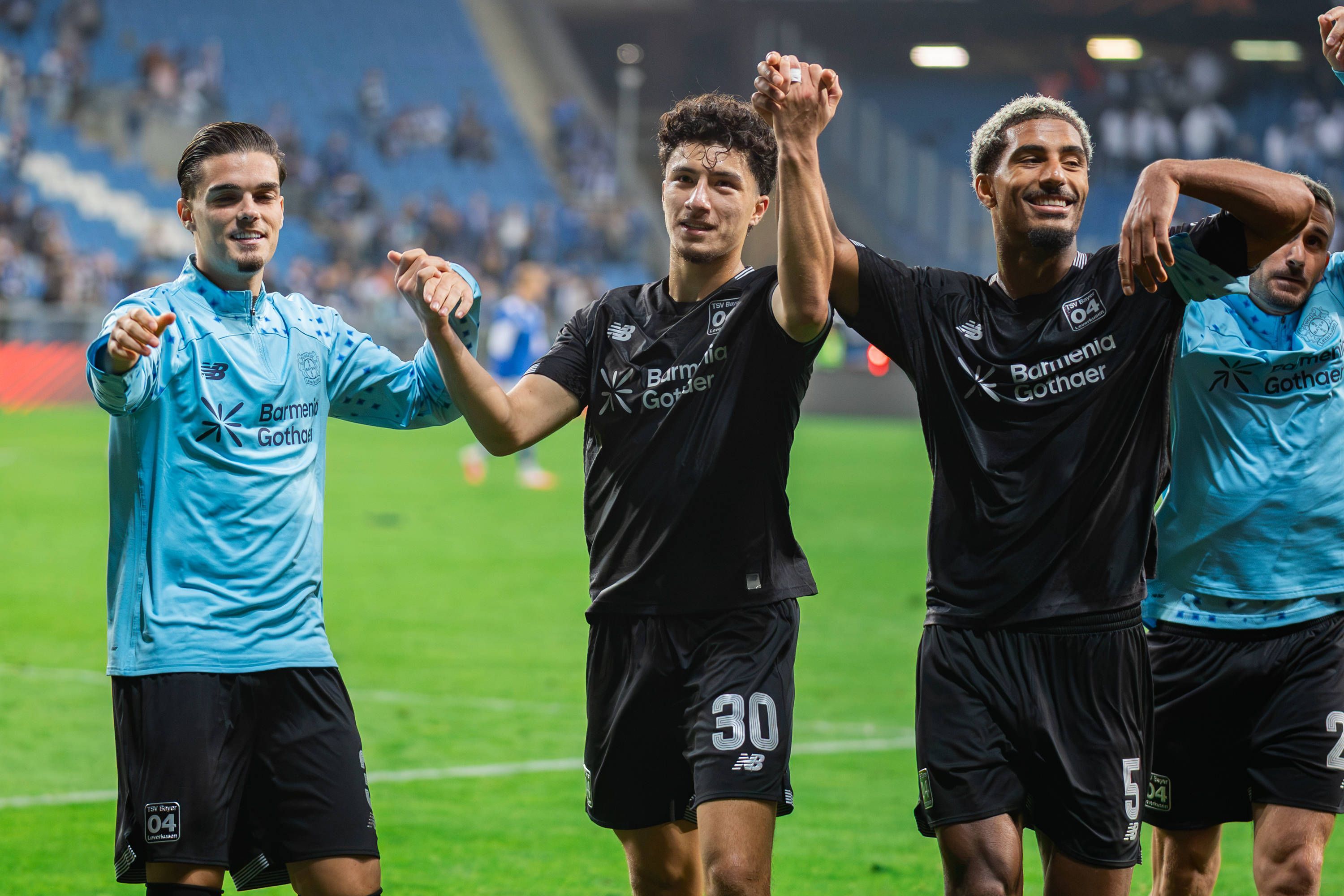 October 15, 2026, Poznan, Poland: Miguel Gutierrez L, Ibrahim Maza C and Loic Bade R of Bayer celebrate a win during the UEFA Europa League match between Lech Poznan and Bayer 04 Leverkusen at Enea Stadium Poznan. Final score Lech Poznan 0:4 Bayer 04 Leverkusen. Poznan Poland - ZUMAs197 20261015_aaa_s197_300 Copyright: xMikolajxBarbanellx
