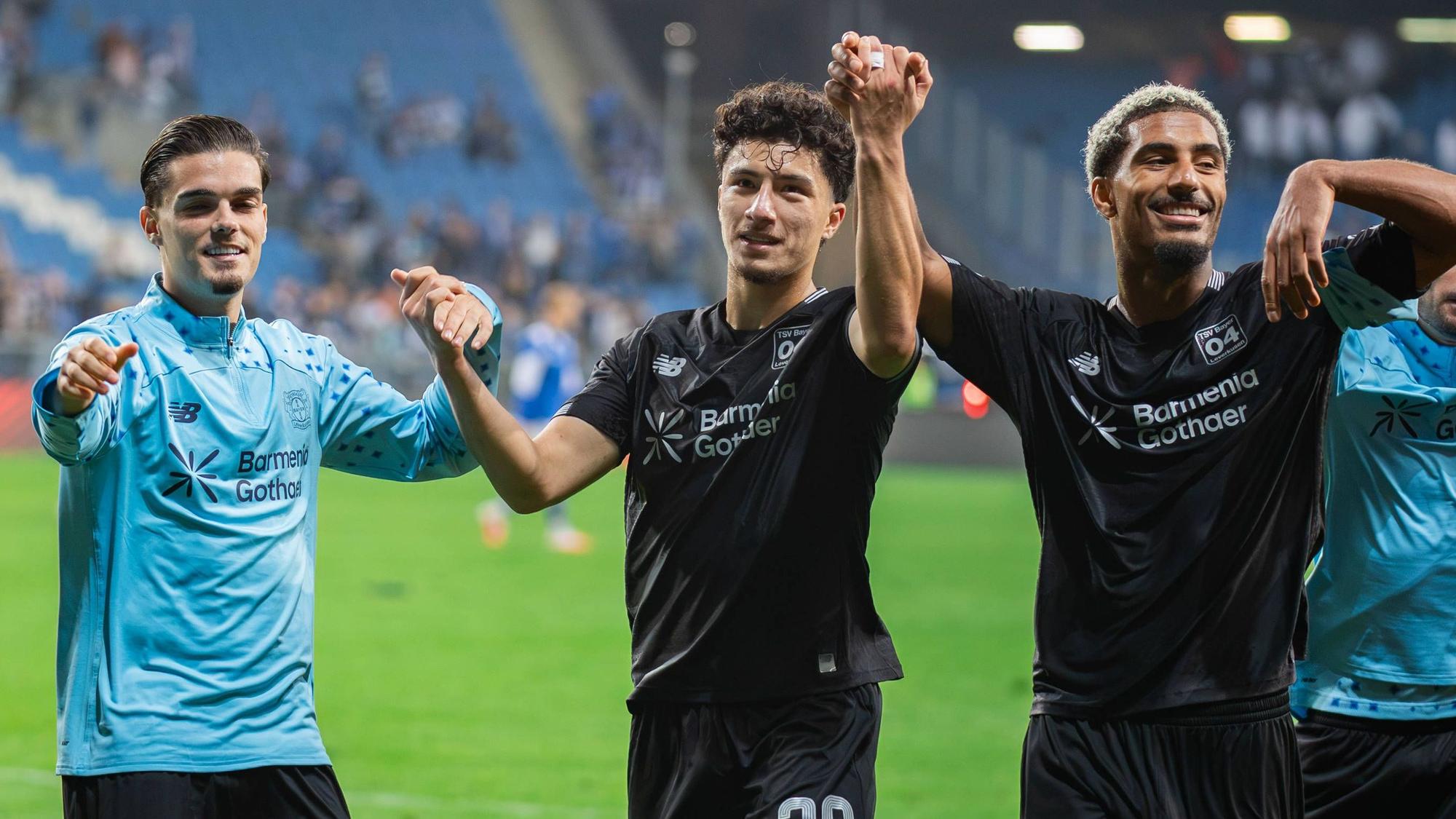 October 15, 2026, Poznan, Poland: Miguel Gutierrez L, Ibrahim Maza C and Loic Bade R of Bayer celebrate a win during the UEFA Europa League match between Lech Poznan and Bayer 04 Leverkusen at Enea Stadium Poznan. Final score Lech Poznan 0:4 Bayer 04 Leverkusen. Poznan Poland - ZUMAs197 20261015_aaa_s197_300 Copyright: xMikolajxBarbanellx