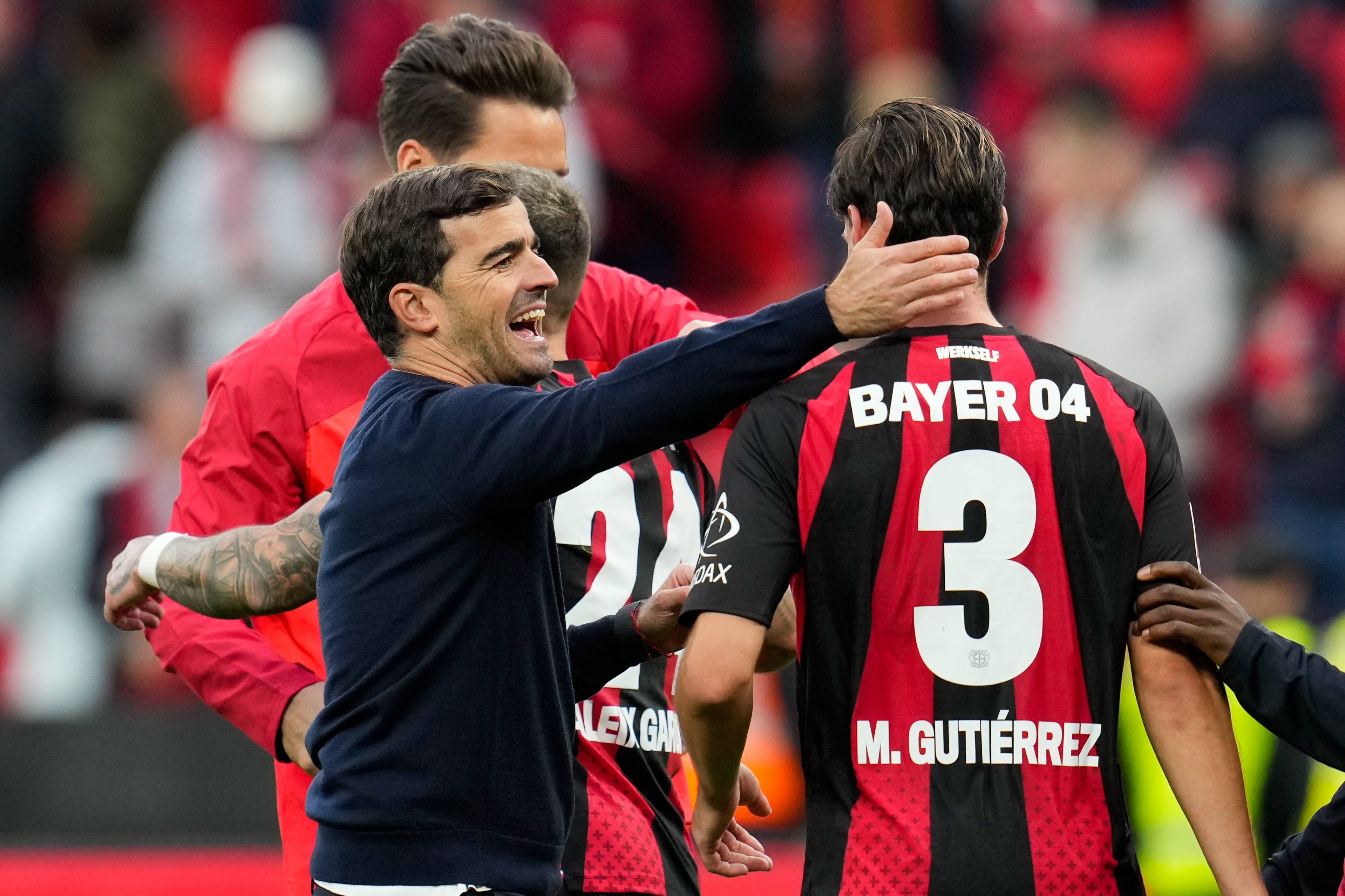 Carles Martinez Bayer 04 Leverkusen, Cheftrainer und Miguel Gutierrez Bayer 04 Leverkusen, 3 nach dem Spiel. GER, Bayer 04 Leverkusen vs SC Freiburg, 1. Bundesliga, 6. Spieltag, Saison 2026-27, BayArena, Leverkusen, 18.10.2026 DFL REGULATIONS PROHIBIT ANY USE OF PHOTOGRAPHS AS IMAGE SEQUENCES AND/OR QUASI-VIDEO Bayer 04 Leverkusen vs SC Freiburg, 1. Bundesliga, 6. Spieltag, Saison 2026-27, 18.10.2026 Leverkusen *** Carles Martinez, Bayer 04 Leverkusen, Head Coach, and Miguel Gutierrez, Bayer 04 Leverkusen, 3 minutes after the game GER, Bayer 04 Leverkusen vs. SC Freiburg, Bundesliga 1, Matchday 6, 202627 season, BayArena, Leverkusen, October 18, 2026 DFL regulations prohibit any use of photographs as image sequences and/or quasi-video Bayer 04 Leverkusen vs. SC Freiburg, Bundesliga 1, Matchday 6, 202627 season, October 18, 2026, Leverkusen Copyright: xEibner-Pressefoto/ScottxColemanx EP_SCN