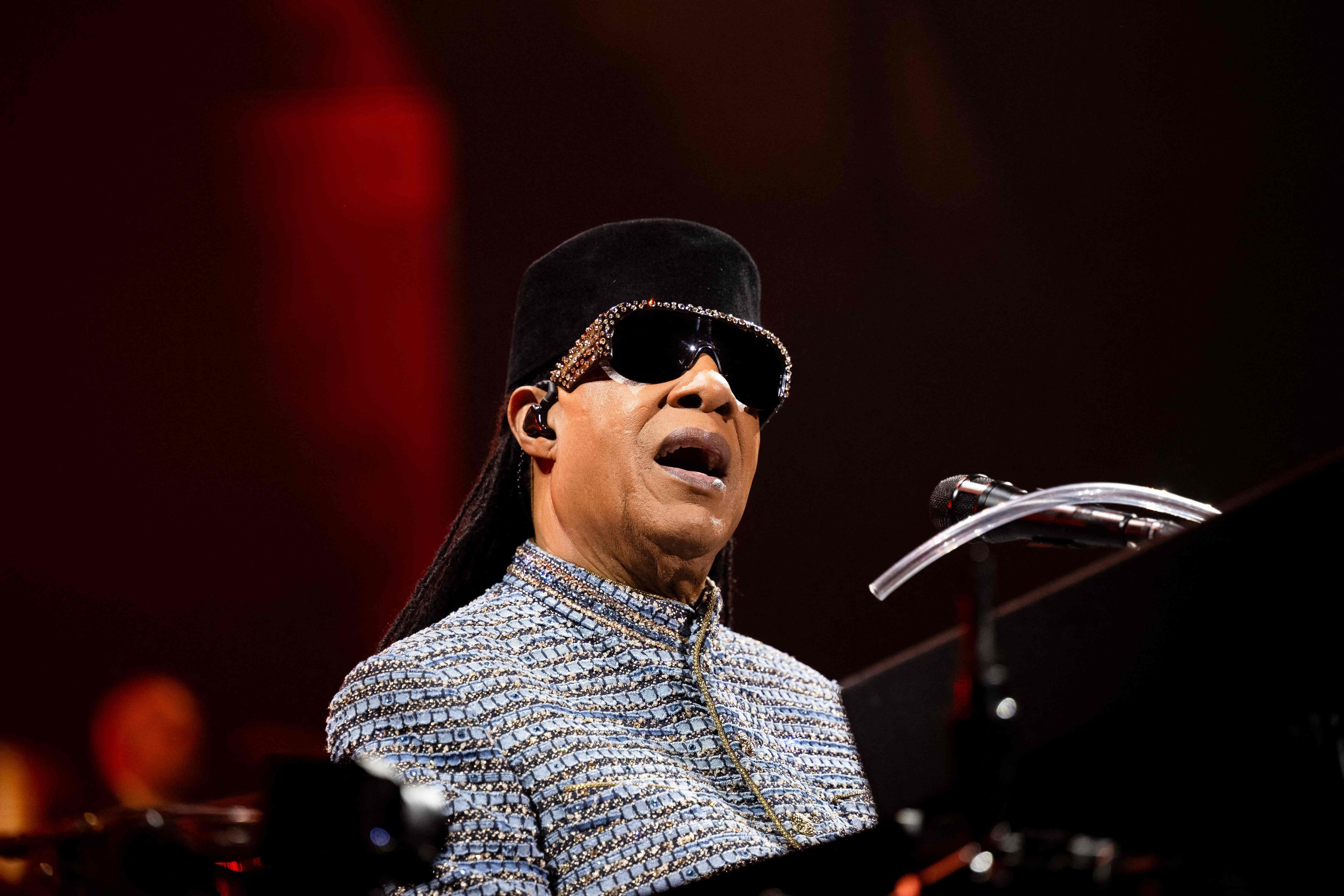 TOPSHOT - US singer, songwriter and musician Stevie Wonder performs on stage at the Accor Arena venue in Paris on October 15, 2026. (Photo by Anna KURTH / AFP) / RESTRICTED TO EDITORIAL USE