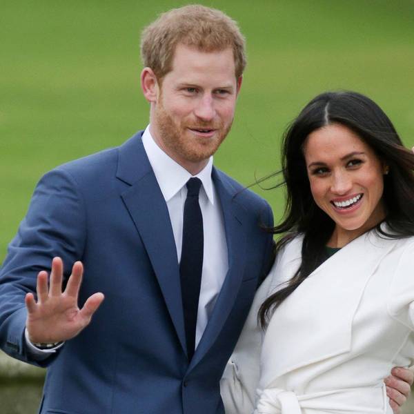 Prinz Harry und Herzogin Meghan winken bei einem öffentlichen Termin.