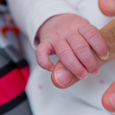 Symbolbild Hand Baby