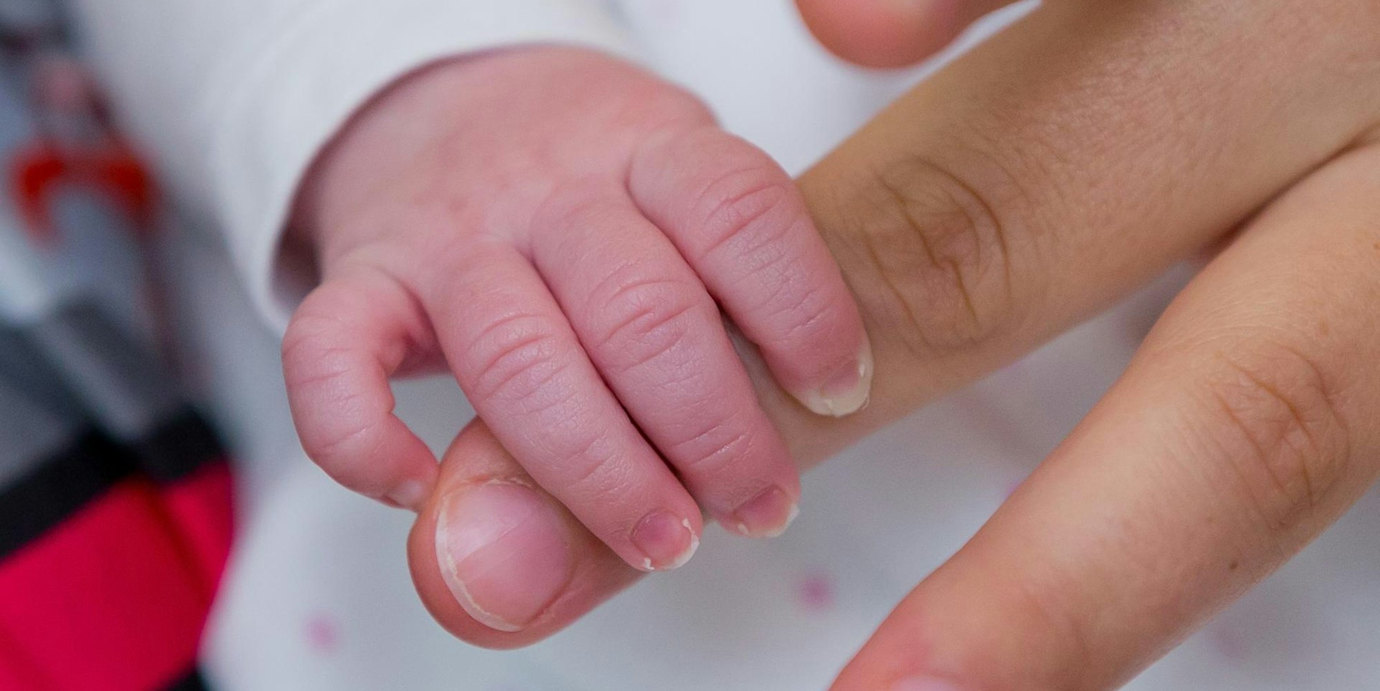 Symbolbild Hand Baby