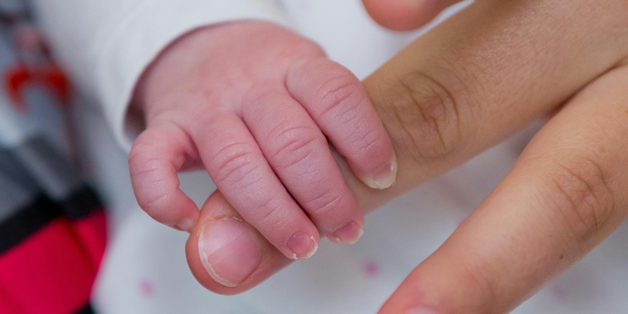 Symbolbild Hand Baby