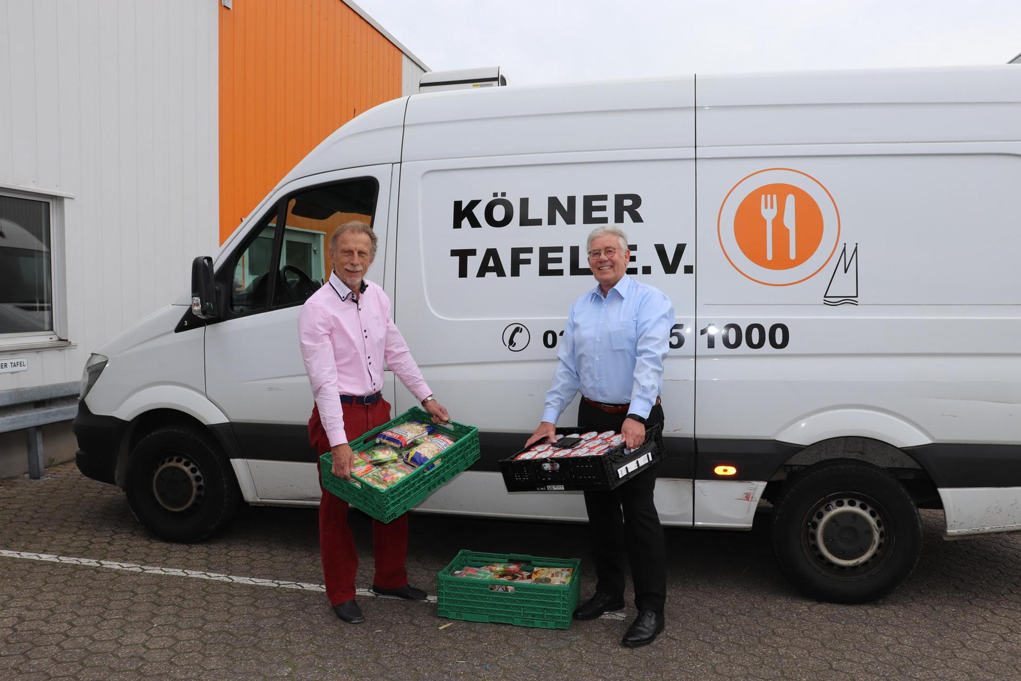 Christoph Daum mit dem Geschäftsfüher die Kölner Tafel