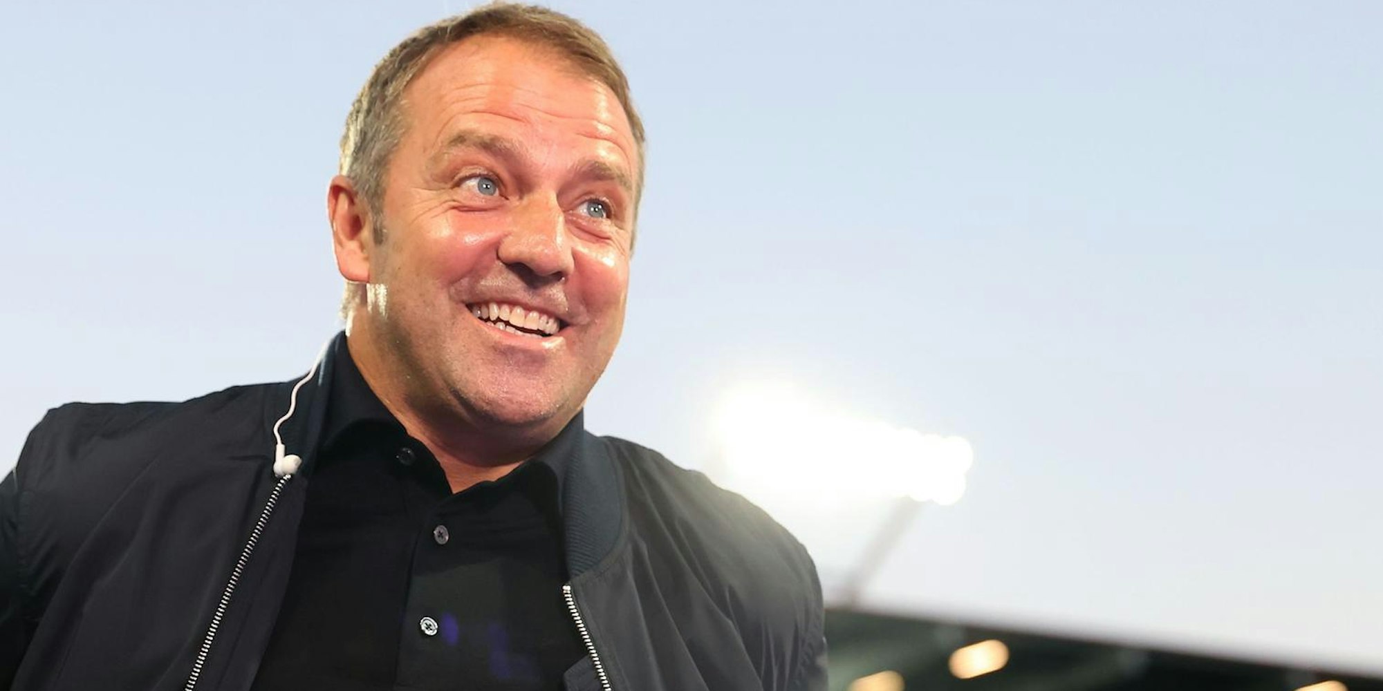 Flick lacht verlegen