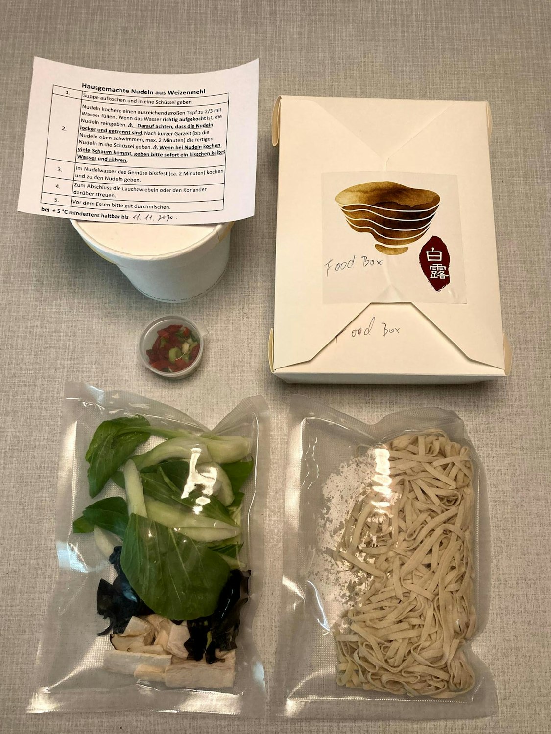 Menü für Nudelsuppe To Go_ Bai Lu Noddles_ Floss