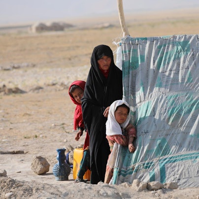 Flüchtlinge in einem Zelt