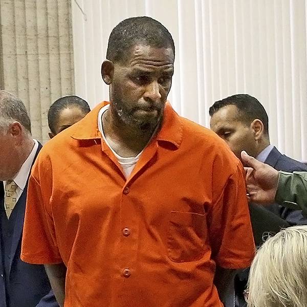 R Kelly orange jacket