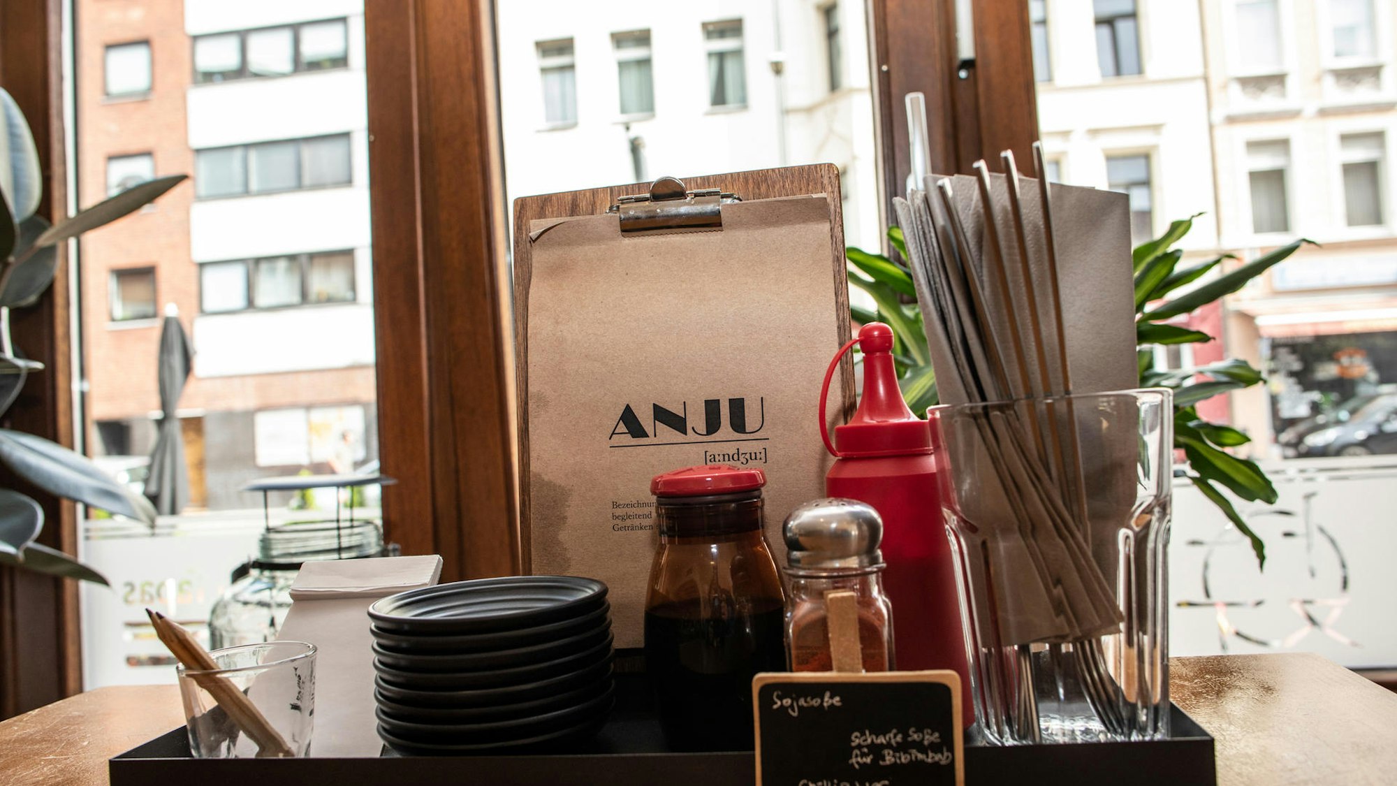 Eine Speisekarte im Restaurant Anju.