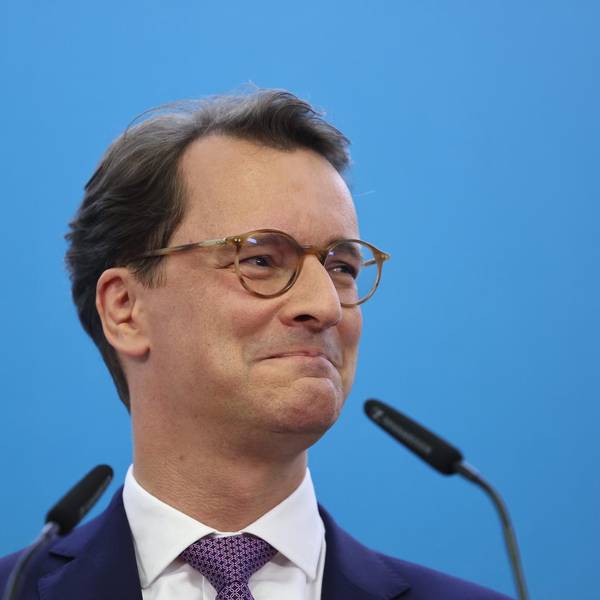 Wüst lacht