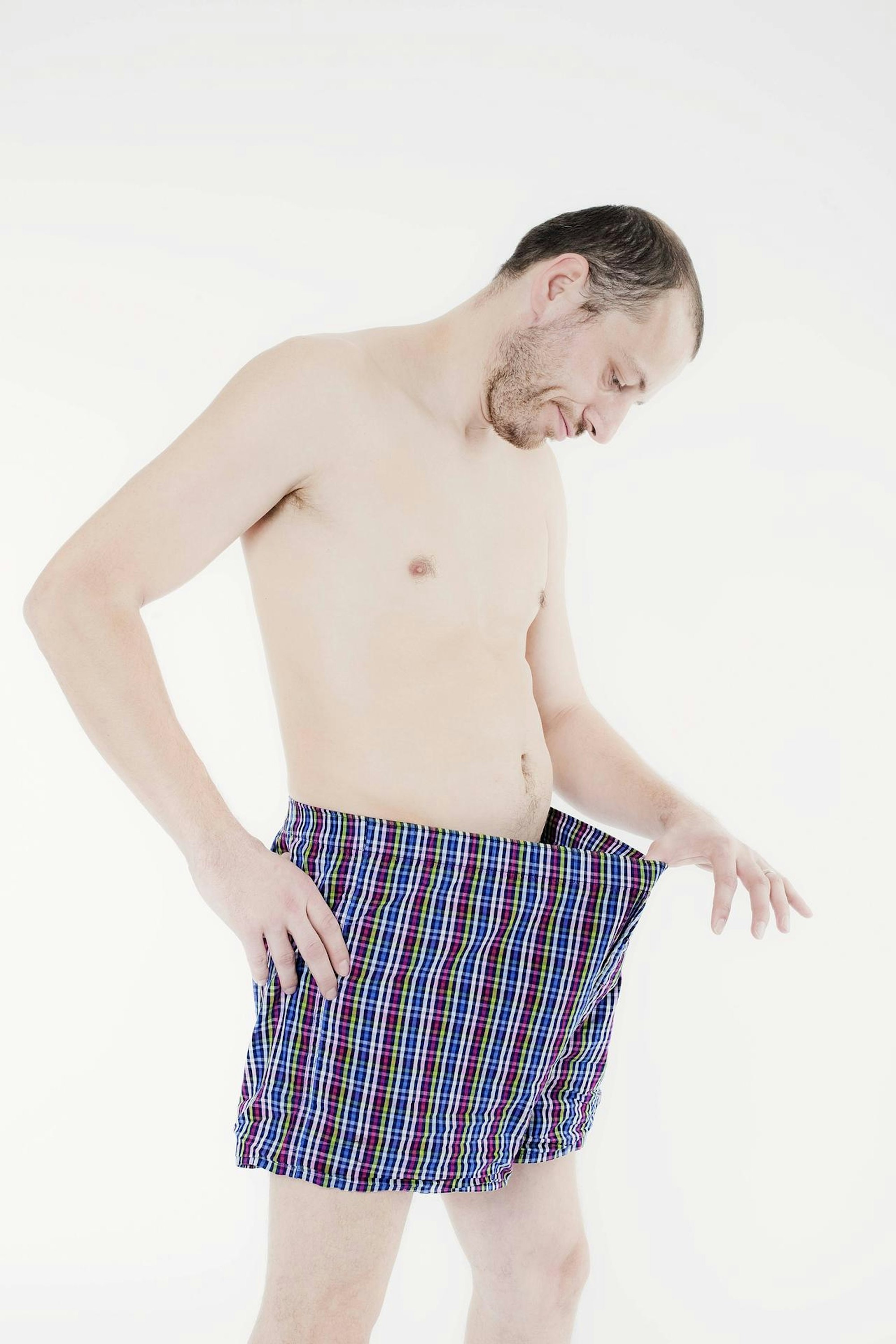 Mann in Boxershorts Penis imago