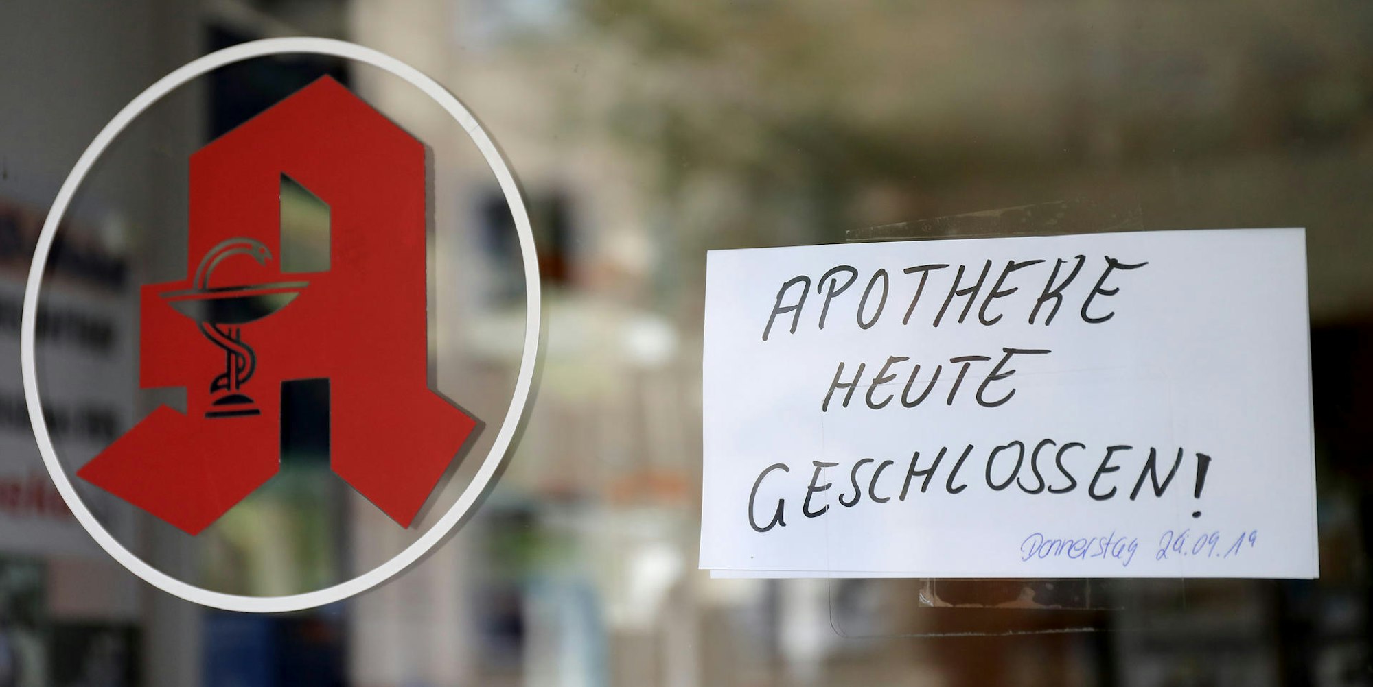 Apotheke handschriftliches Schild