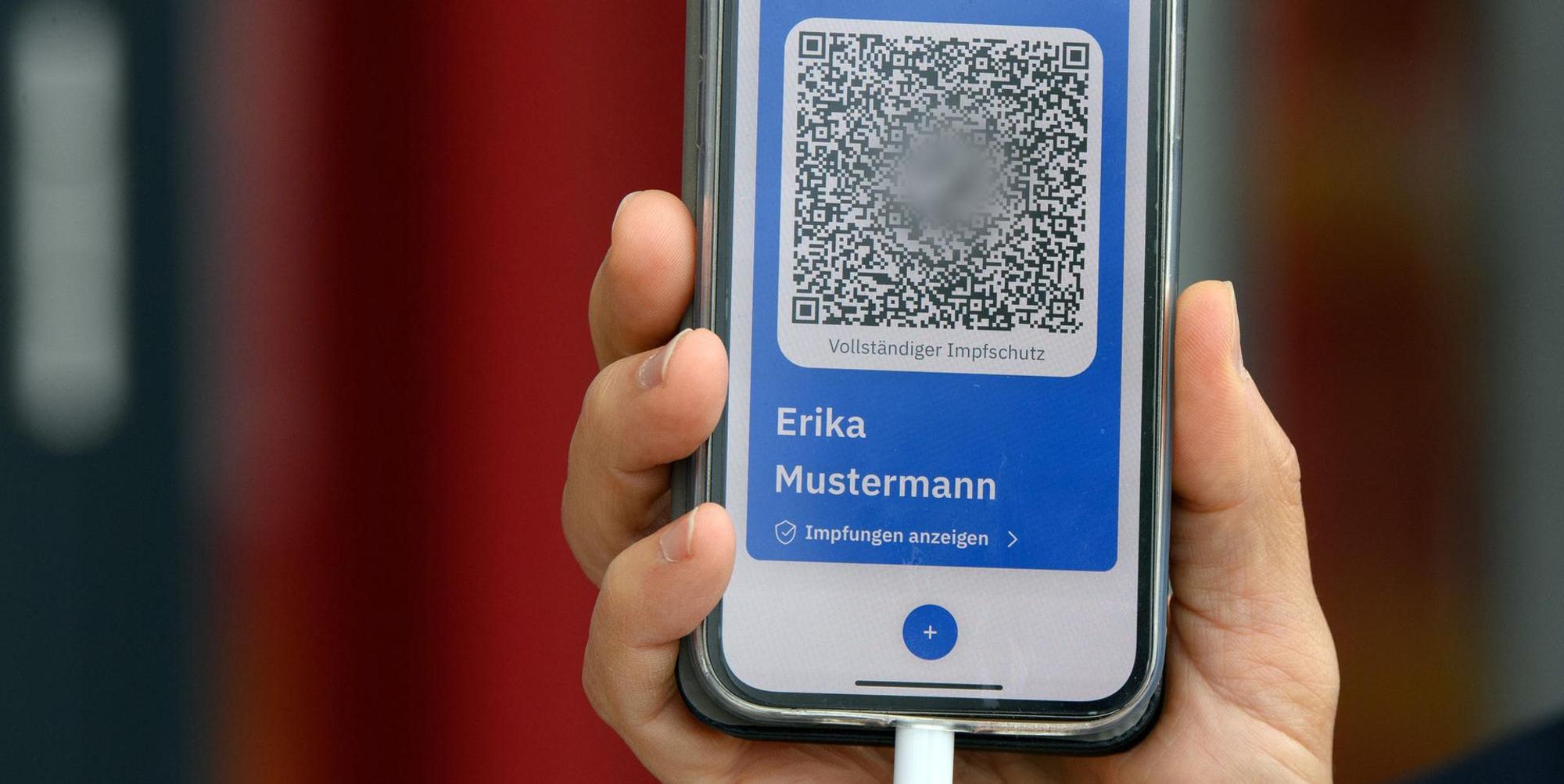 CovPass Symbolbild Handy App QR (1)