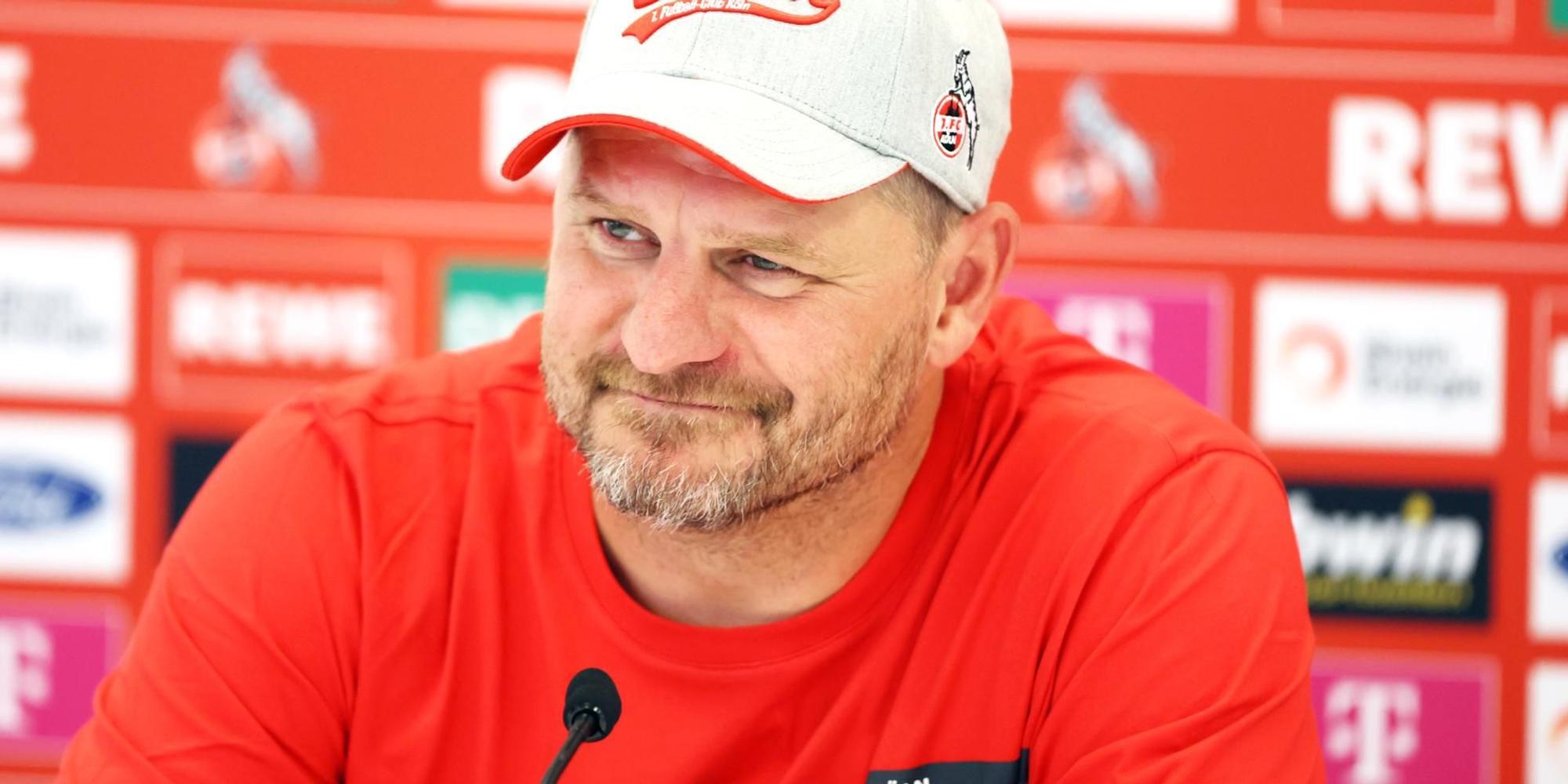 Baumgart lächelt in rot