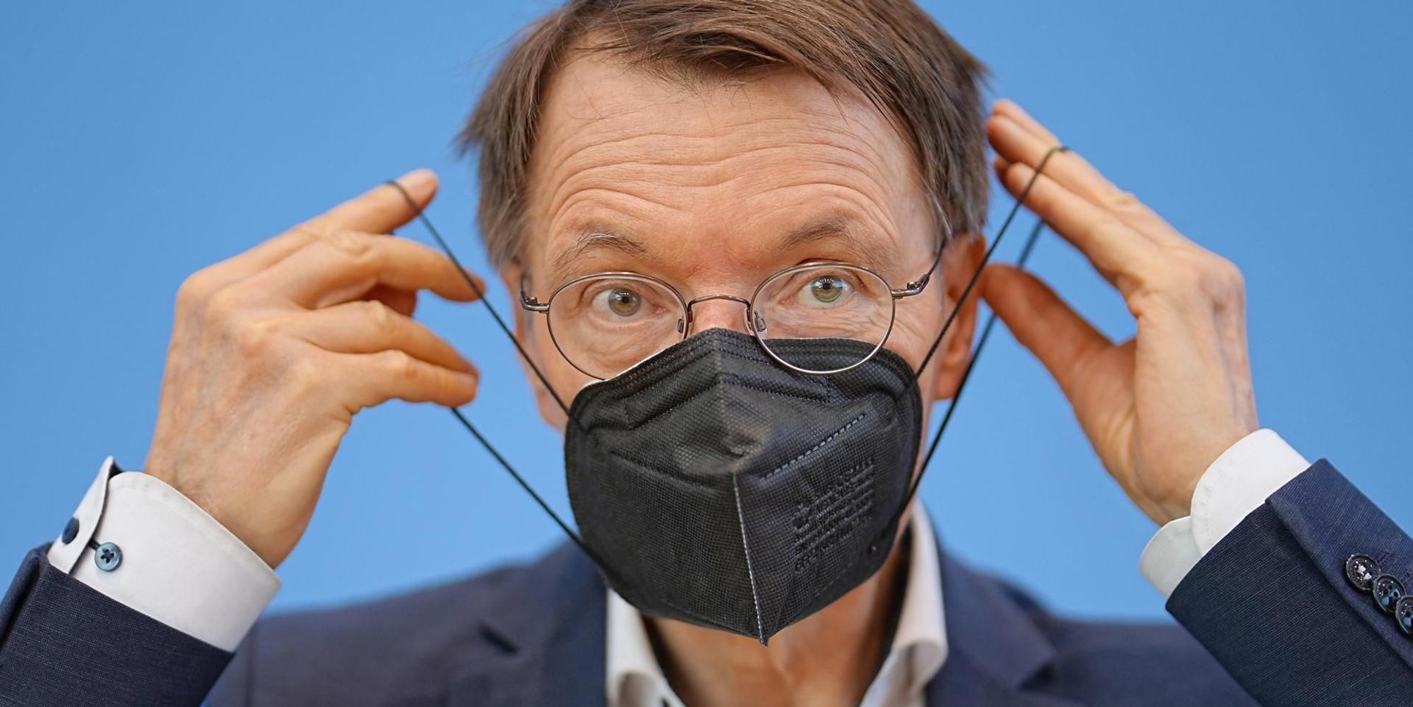 Karl Lauterbach Maske Symbol
