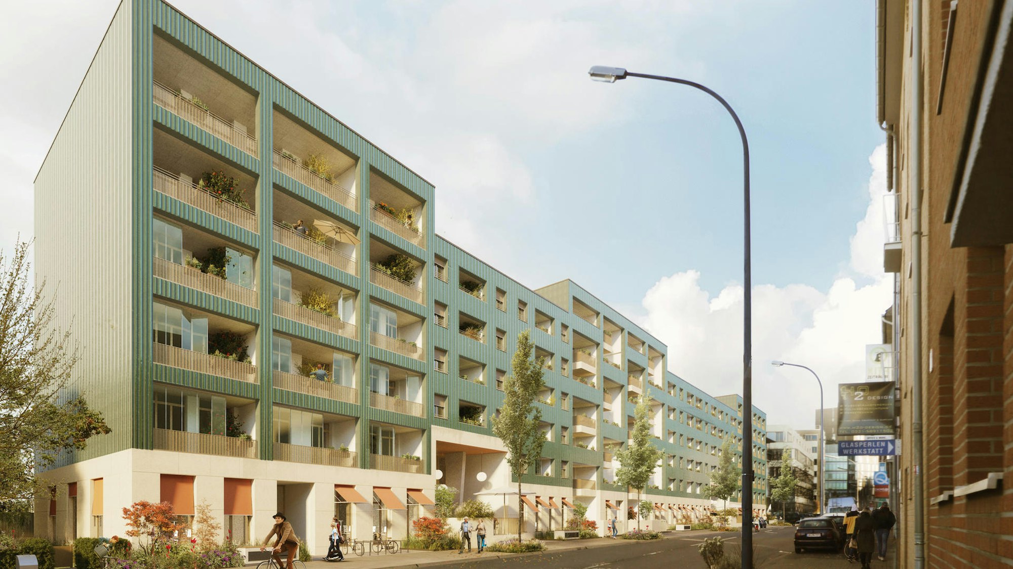 Ein grünes, 130 Meter langes Wohngebäude in Braunsfeld