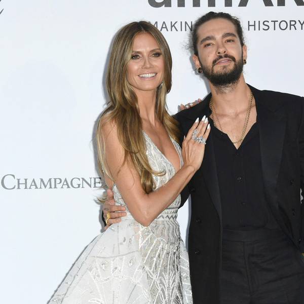 Heidi Klum und Tom Kaulitz posieren für Fotografen.