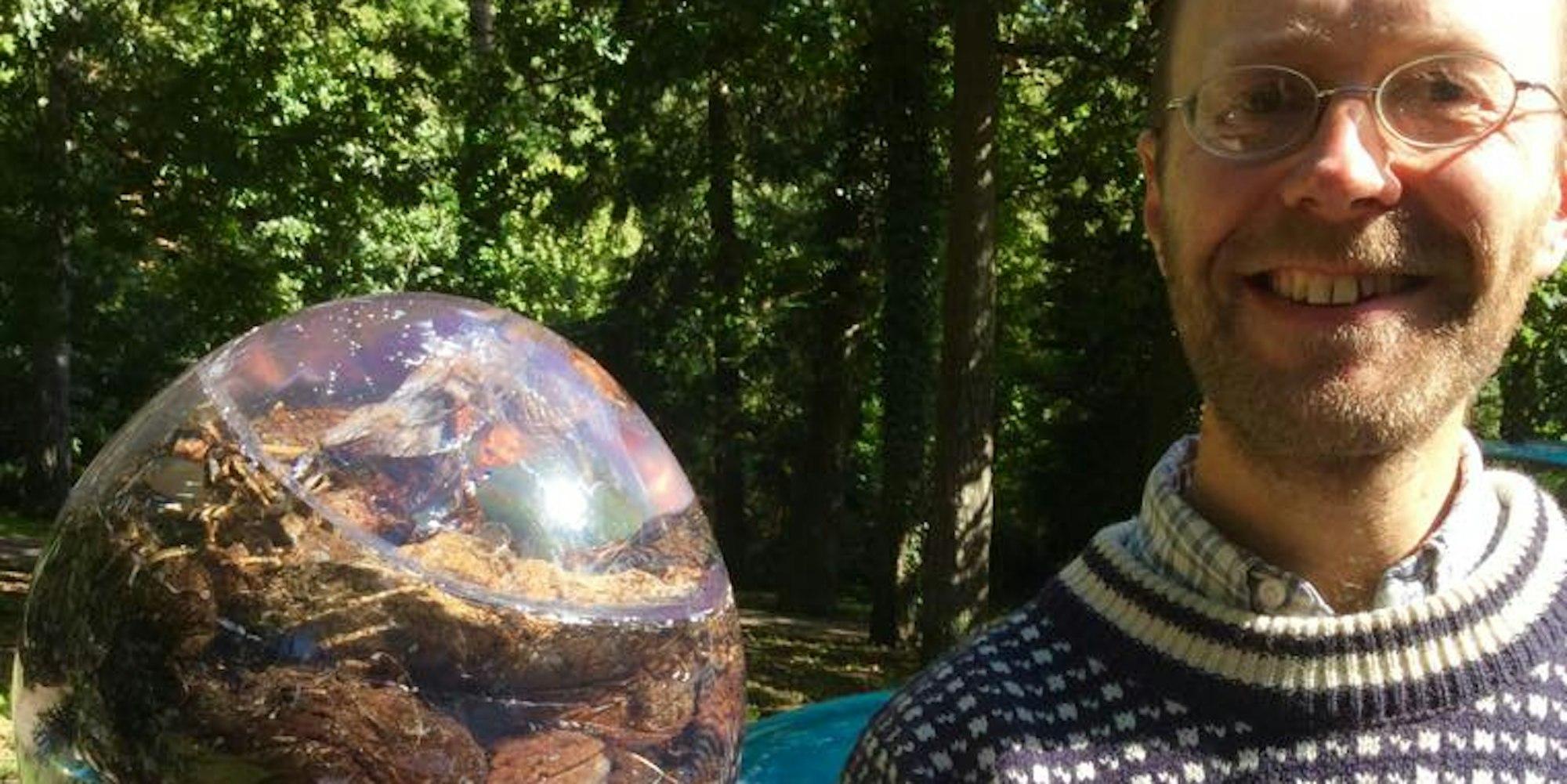 Dan Roberts with lion poo