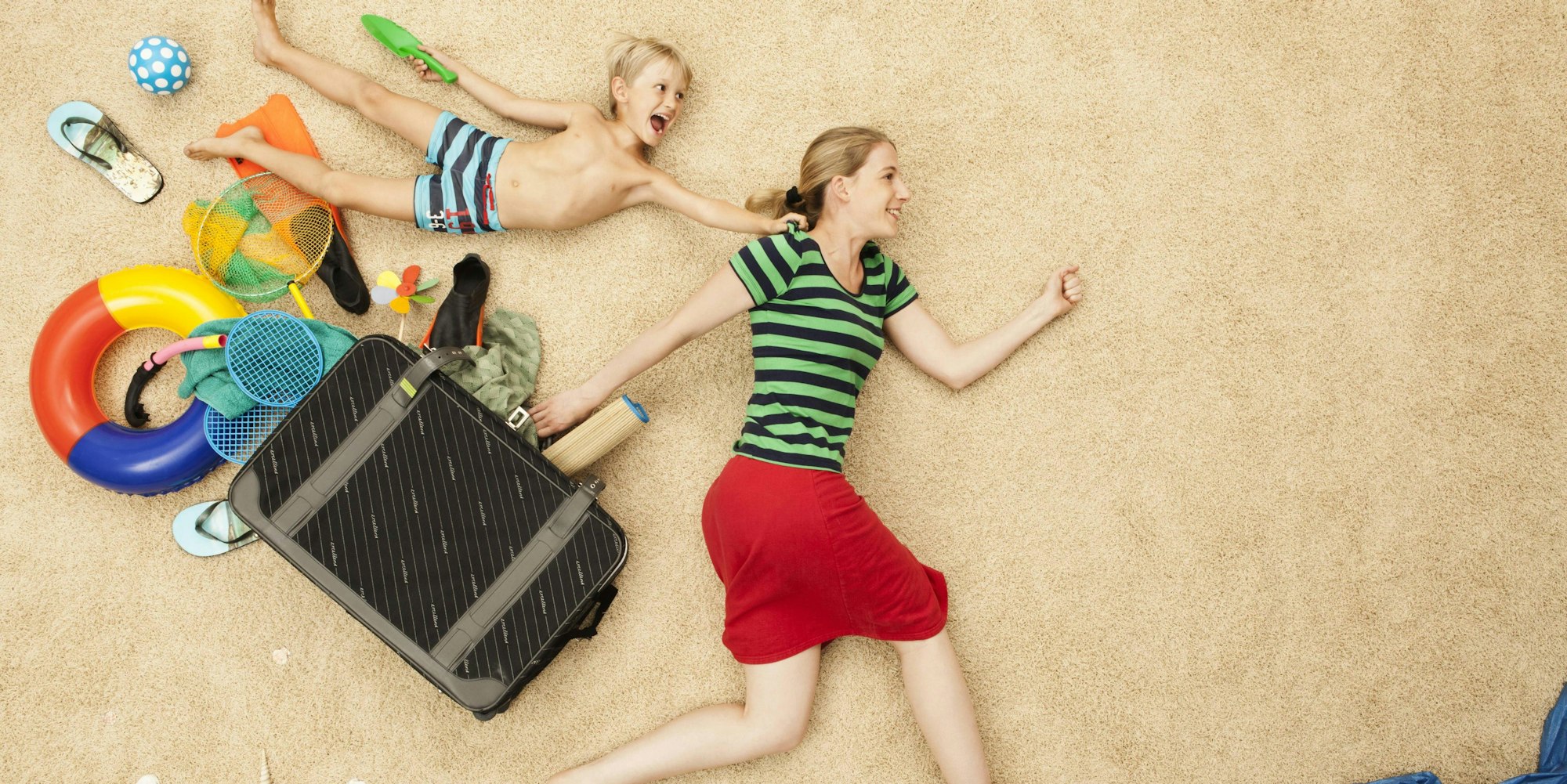 mutter_koffer_strand_familie_imago